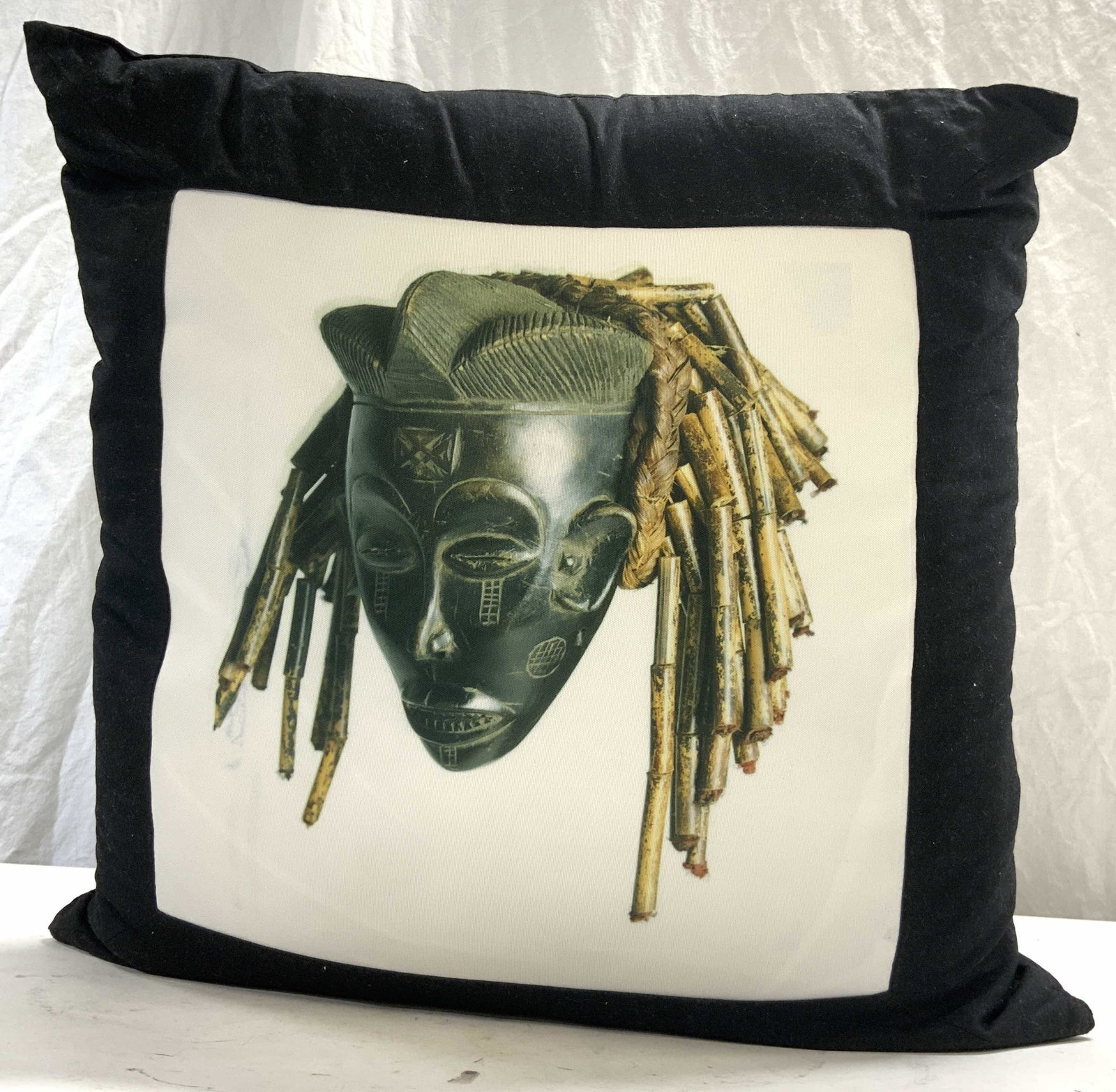 Pillow W Image Of African Wood Carving: Pillow is black with image of African tribal wood carving. Pillow measures approx 17 inches square 7 inches deep. Pillow, throw pillow, pillow with picture, pillow with image, pillow with image of Afr