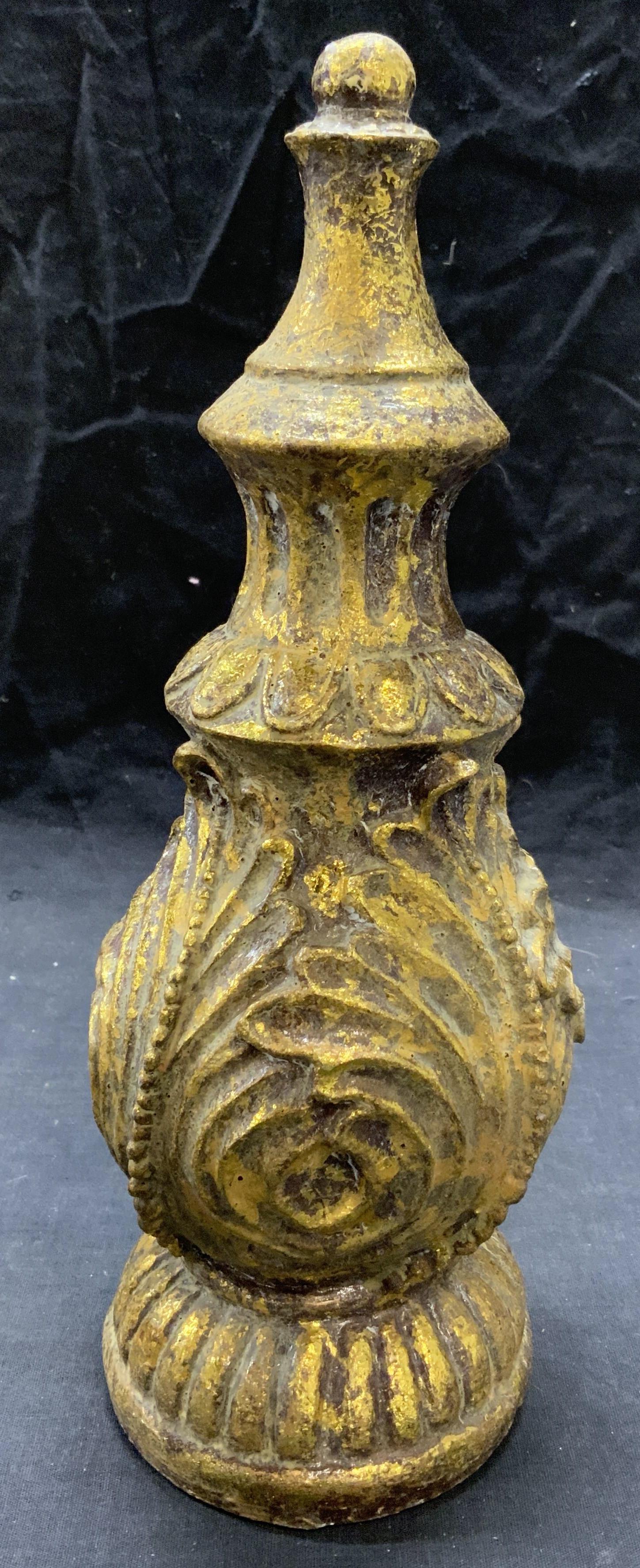 Gilt Plaster Table Top Accessory: Gilt plaster table top accessory with scroll motif. Surface wear consistent with exposure. Measures approx. 4 inches diameter and 12 inches tall. Table accessories, table decor, home decor, home acces
