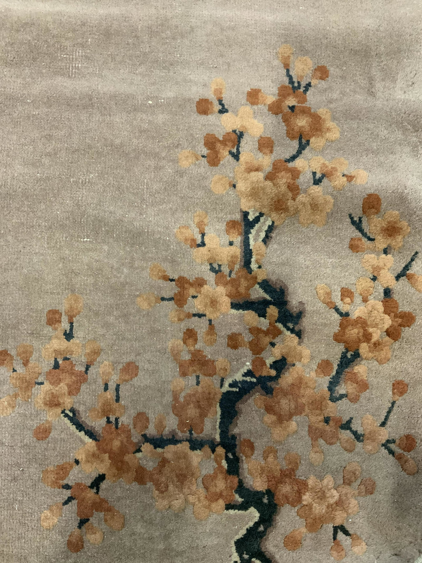 Vintage Chinese Art Deco Wool Rug: Rug is handmade and wool. Piece is vintage possibly antique. Rug has sand toned fringes at edges. Rug has intricate multi toned tree detail measures approx 53 inches long 30 inches wide. Rug, wool rug
