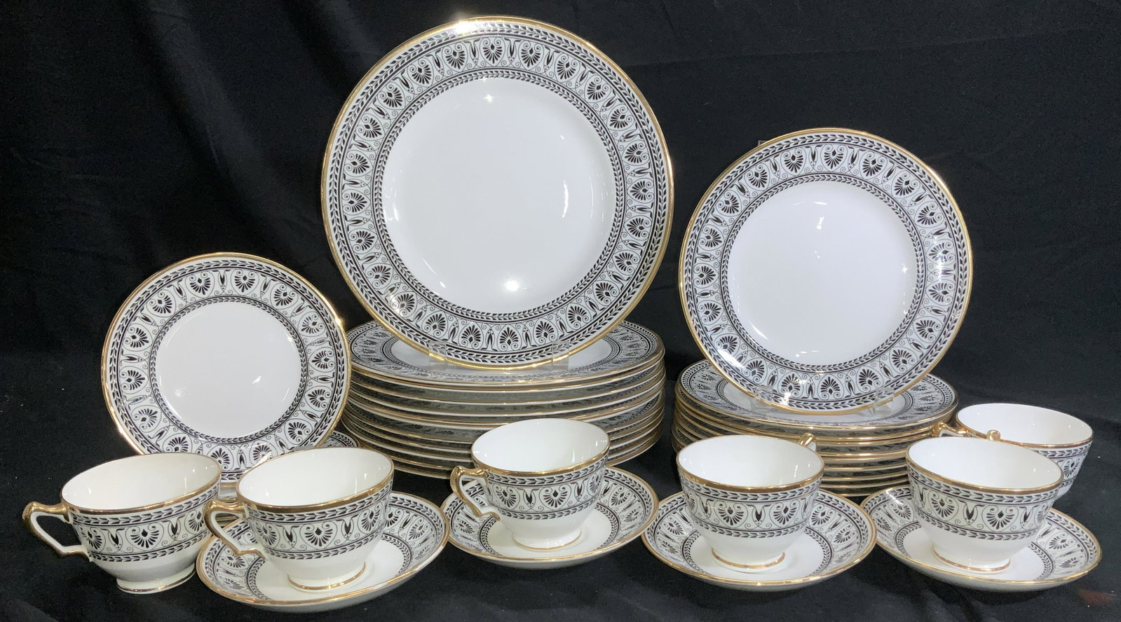 Crown Staffordshire Chinaware Set 37 England: Bright white porcelain with black design and 24 k gilt rim .all hallmarked . China resembles Queen Victoria and Prince Alberts personal China set, on display at the Victorian & Albert Museum. Set incl