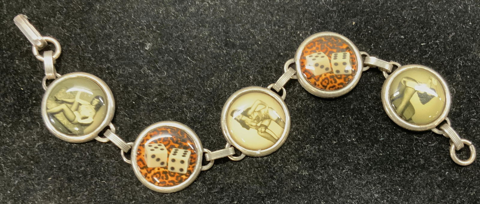 Pin Up Girl Link Fashion Bracelet: 5 round links featuring pin up girls and dice, 7.5 in. L bracelet, digital print behind clear resin. Fashion jewelry, statement jewelry, costume jewelry luxury jewelry, cocktail jewelry, chunky jewelr