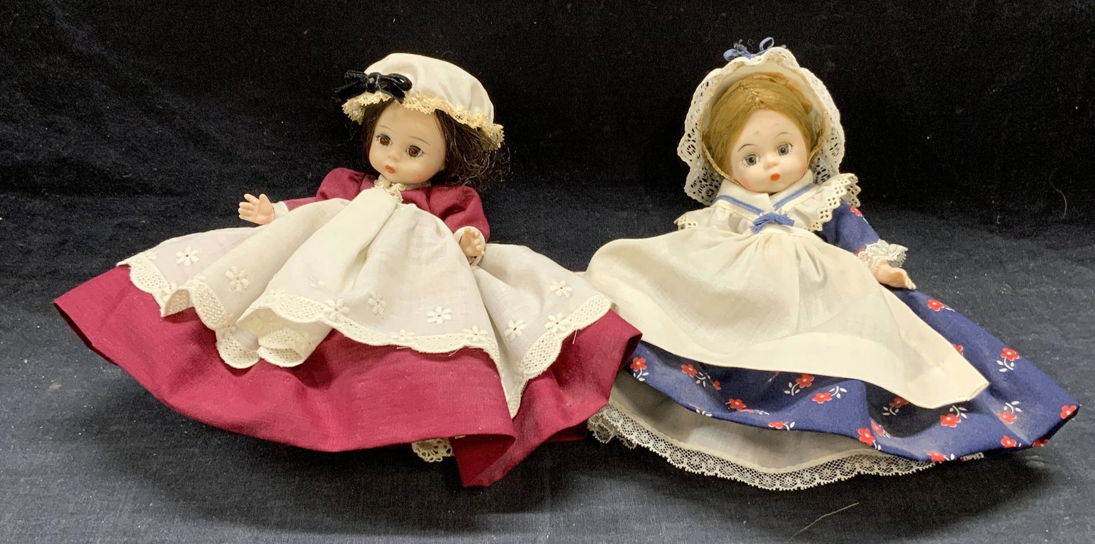 Lot 2 Vintage Madame Alexander Dolls: Lot of 2 vintage Madame Alexander articulated dolls with blue and red dresses and bonnets. Doll with red dress labeled Alexander-Kins Marme. Doll with blue dress labeled Madame Alexander Betsy Ross. S