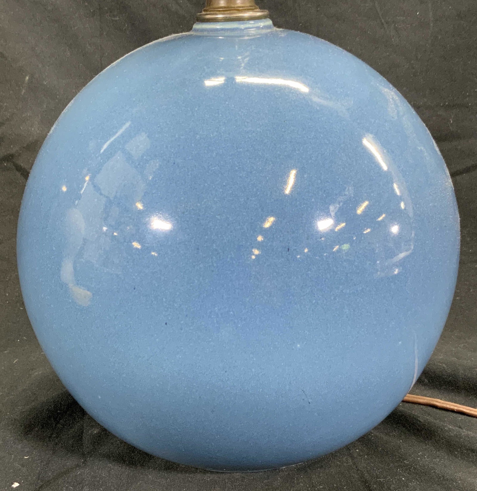 Vintage Spherical Porcelain Lamp Blue: Lamp is blue toned & porcelain. Piece has spherical shape. Lamp includes finial & harp. Lamp measures approx 18 inches tall 8 inches wide. Lamp, blue lamp, vintage lamp, spherical lamp, table lamp, ho