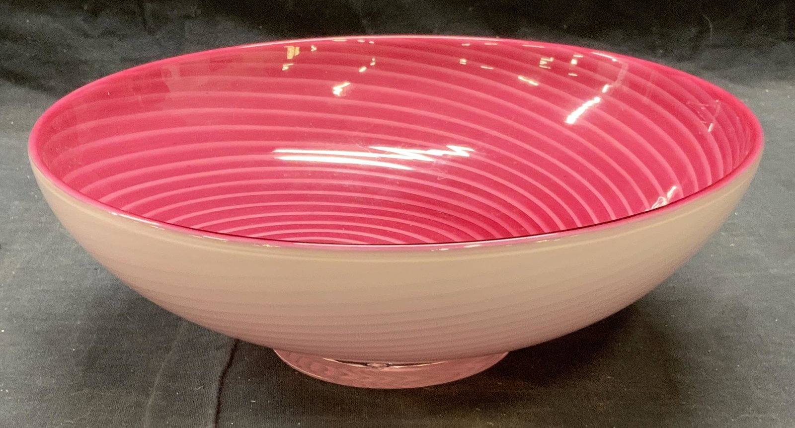 CHURCH & MAPLE Pink Swirl Art Glass Bowl: Signed pink swirl art glass bowl. Some surface wear consistent with exposure. Signature etched Church and Maple to underside. Dated 2002. Measures approx. 9 3/8 inches diameter and 3.25 inches. Art gl