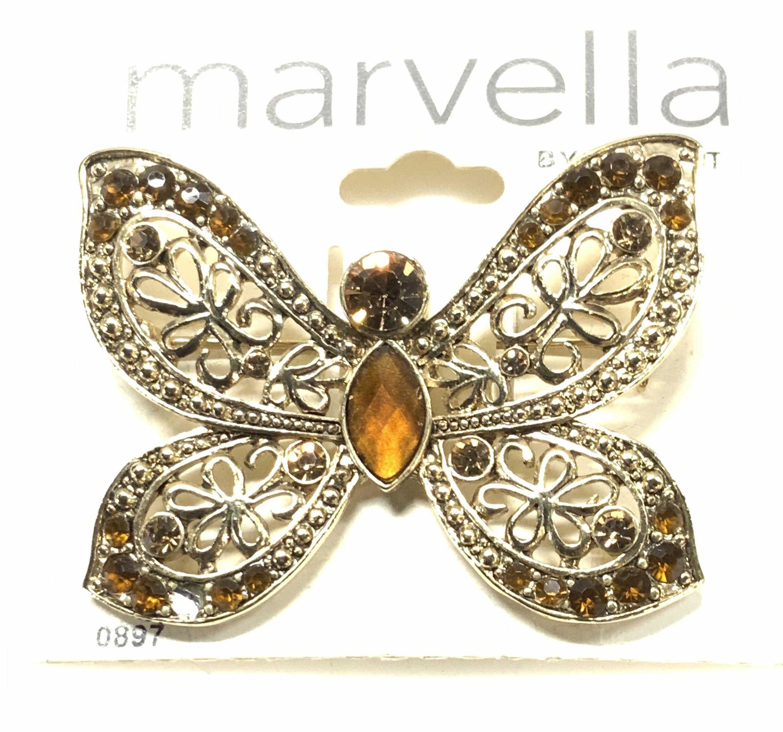 Marbella by MONET Crystal Butterfly Brooch NIP: Gold tone butterfly with amber and clear crystals . New in package that reads Marbella by Monet. Measures 2 x 1.75 in. 1 Crystal missing. Brooch ,Marbella y Monet Butterfly Brooch, crystal gold tone b
