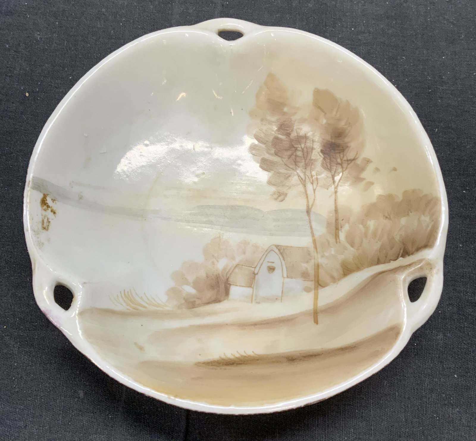 Antique Hand Painted Nippon Porcelain Bowl: Antique hand painted Nippon porcelain bowl with landscape and exterior view of home. Made in Japan for export to USA. Surface wear consistent with exposure, crazing observed. Measures approx. 5.75 inc