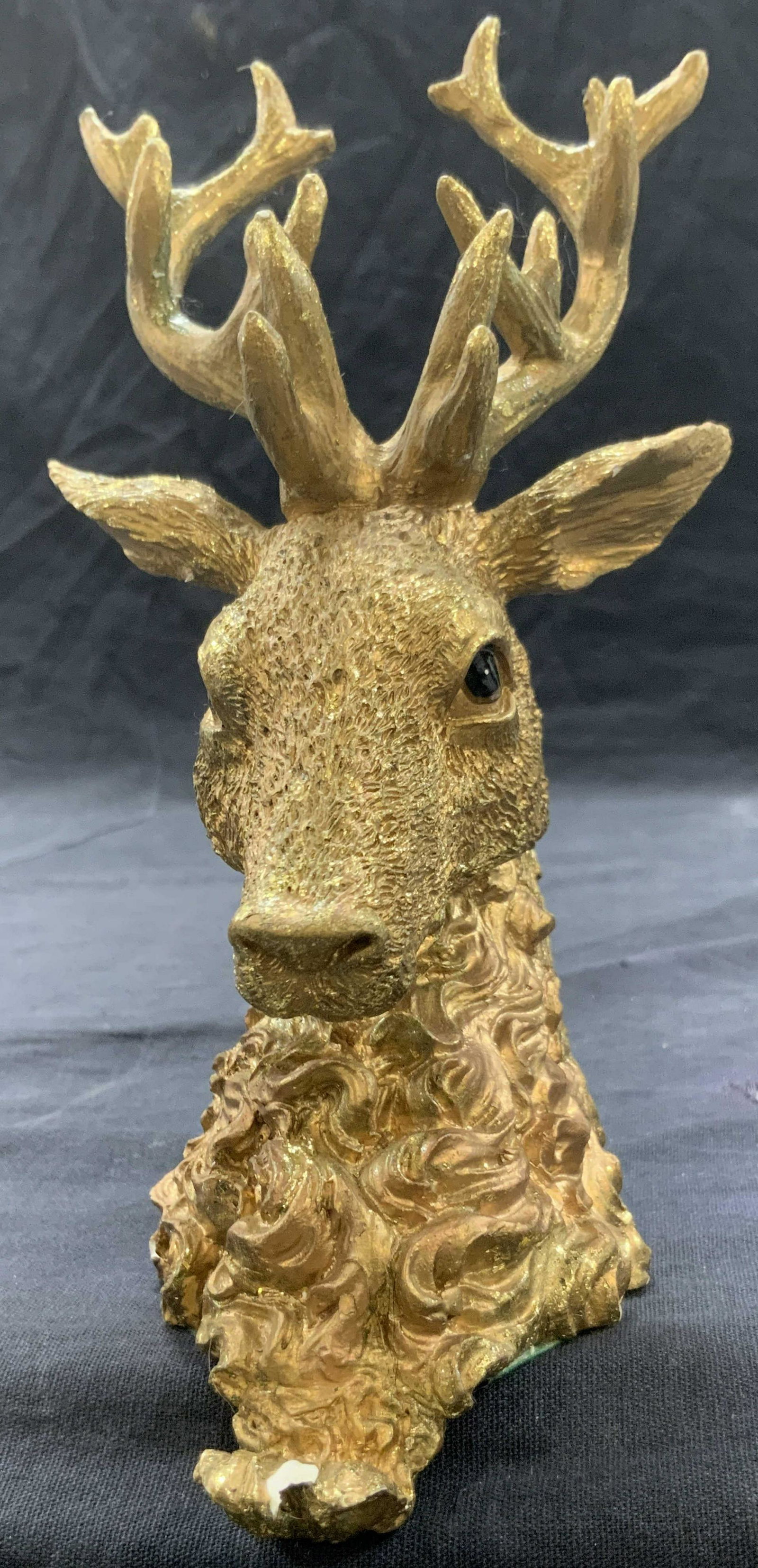 Holiday Reindeer Plaster Stocking Holder: Holiday stocking mantle holder, made it resemble a reindeer head with expansive antlers. Possibly made of plaster. Approximately 8 inches tall Moderate loss to hook and to certain areas Holiday stocki