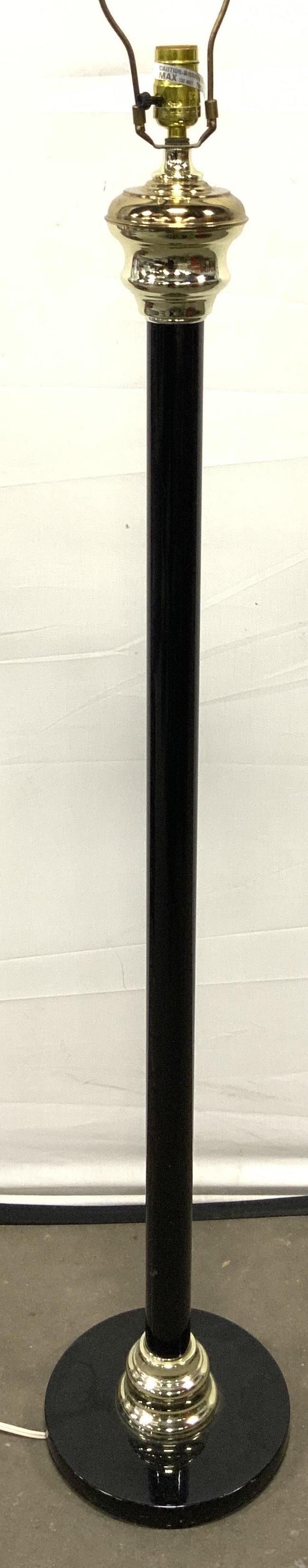 Vintage Metal Floor Lamp Black & Gold Toned: Lamp is metal. Piece is black and gold toned. Lamp is vintage. Piece has circular shaped Base. Lamp includes harp and loop shaped finial. Piece measures approx 61.5 inches tall 10 inches wide. Lamp, m