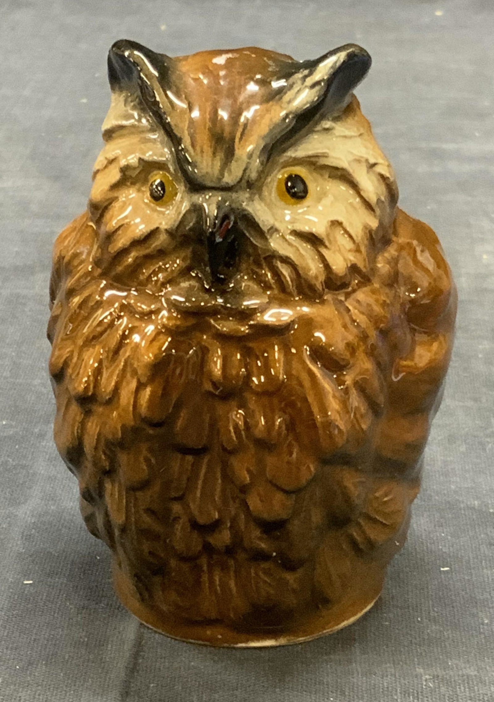 GOEBEL V8tage Porcelain Owl Figurine, Germany: GOEBEL Vintage brown glazed porcelain owl figurine. Trademarked to underside. Made in West Germany. Numbered 38 318 08. Some surface wear consistent with exposure. Measures approx. 2.25 x 2.75 x 3.5 i