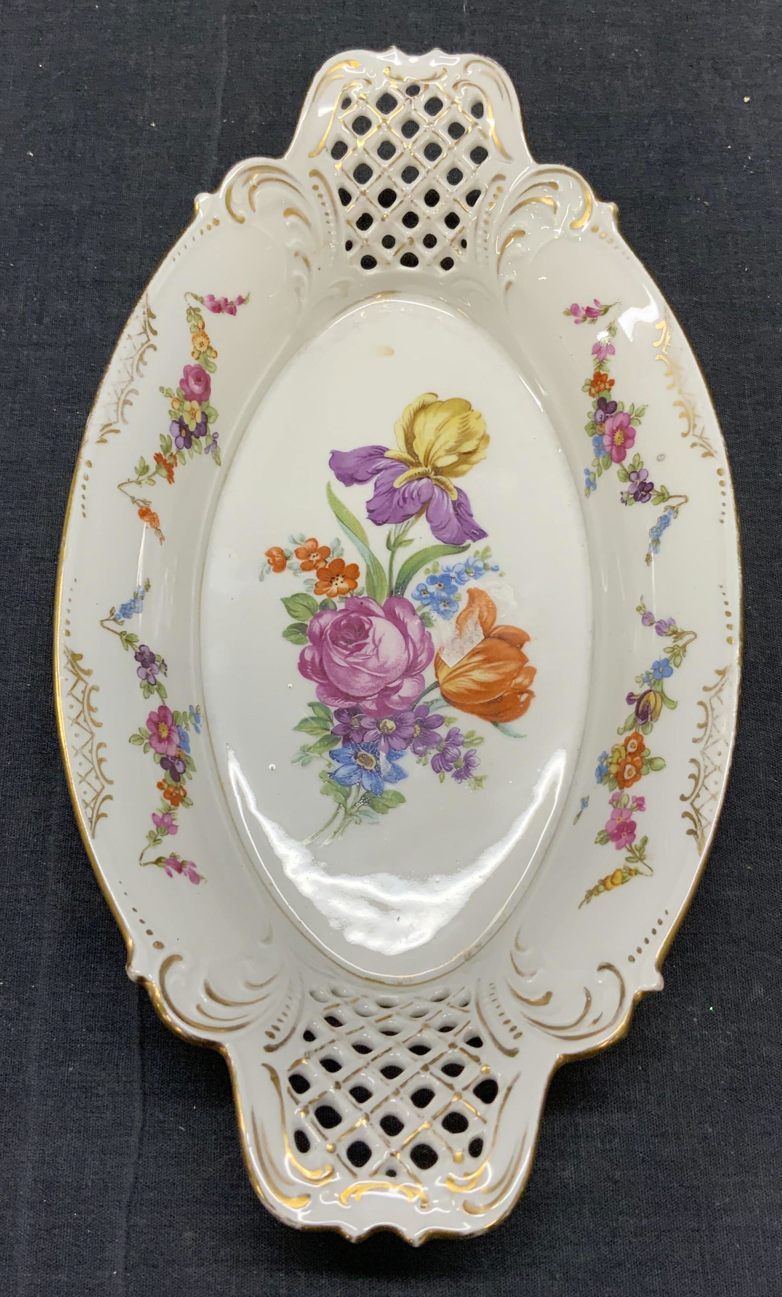 Vintage SHUMANN BAVARIA Porcelain Bowl: Vintage, possibly antique, SHUMANN Bavaria porcelain bowl with floral motif and gilt decoration. Trademarked to underside. Made in Germany. Some surface wear consistent with exposure. Measures approx.