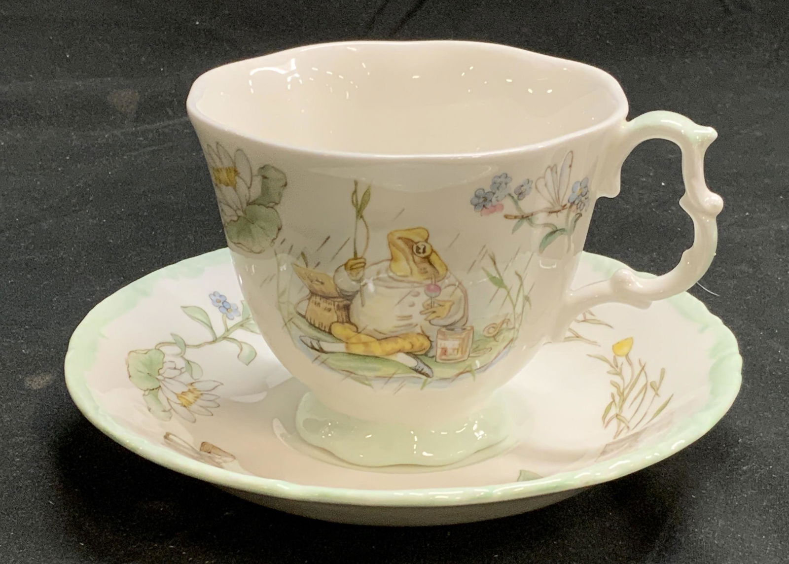 Vtg ROYAL ALBERT Beatrix Potter Teacup & Saucer: Vintage 1986 Royal Albert fine bone china teacup and saucer. The World of Beatrix Potter collection by Jeremy Fisher. Pieces trademarked to undersides. Saucer measures approx. 5.5 inches diameter. Tea