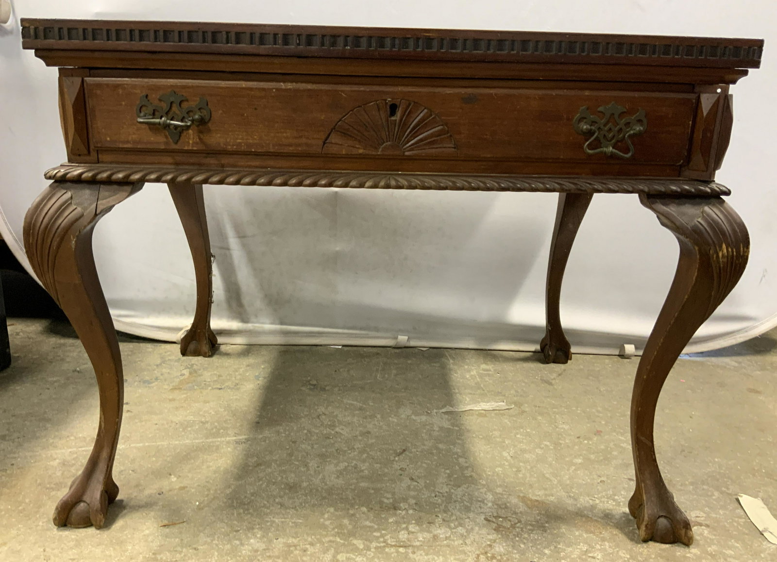 George II Style Vntg Wooden Ball & Claw Foot Desk: Desk is George II Style. Piece is vintage possibly antique. Desk has carved wooden ball & claw foot detail. Piece has 1 drawer with gold toned brass handles & hand dovetailing. Desk measures approx 39