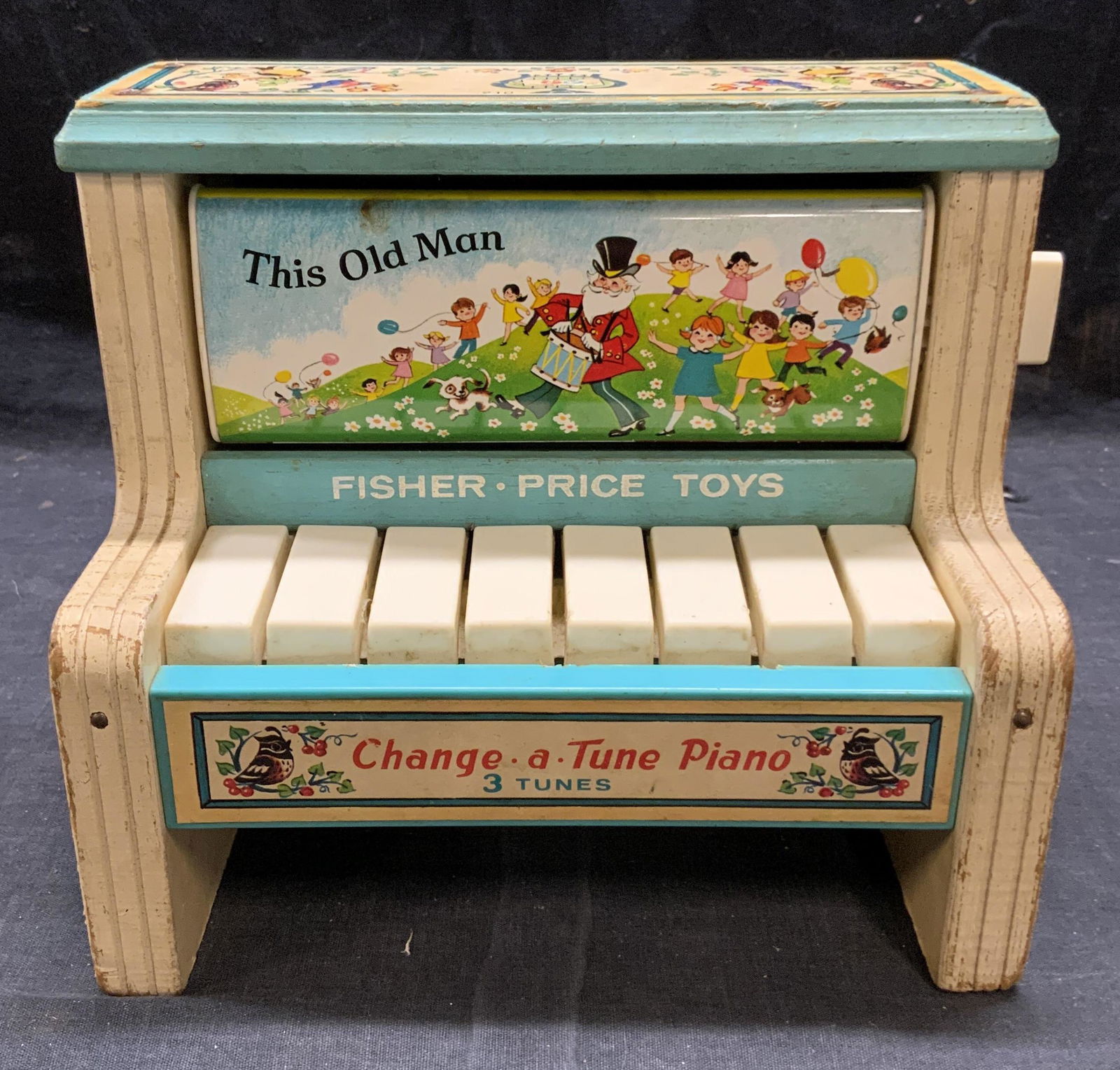 Vintage Fisher Price Change A Tune Piano: Vintage 1969 Fisher Price Change A Tune Piano. Not tested for function. Surface wear consistent with exposure. Measures approx. 8.25 x 5 x 7.25 inches. Fisher price, change a tune piano, childrens toy