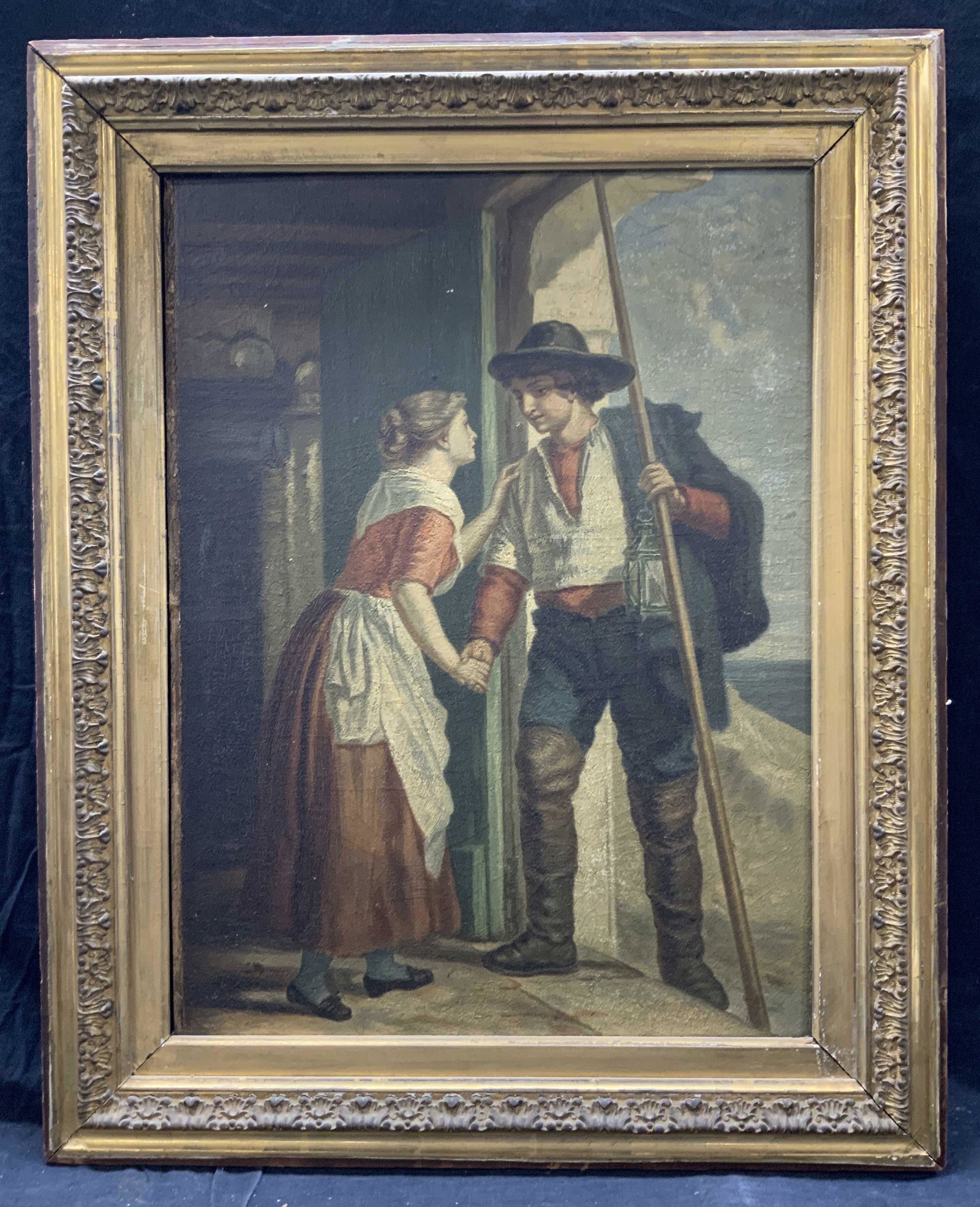 Vintage Spear Fisherman & Wife Oil Painting: Vintage possibly antique oil painting on board. Depicting a spear fisherman at the threshold of a house with a blonde woman holding his hand and arm. Framed in gold metal leafed wooden frame with orna
