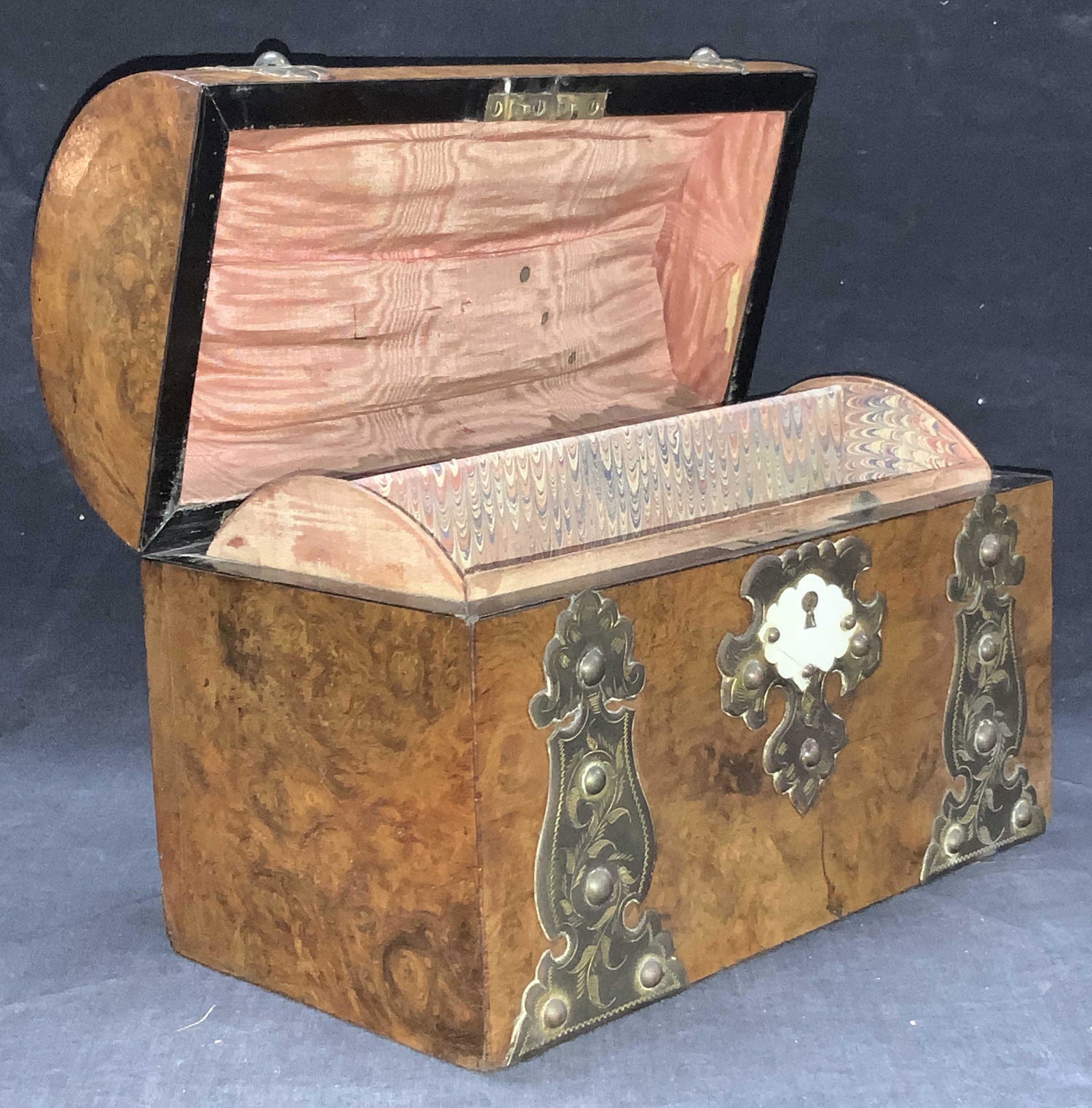 Vintage Oak and Metal Overlay Letter Box: Vintage, possibly antique oak wood letter box with patina brass overlays and white bone accents. Brass overlays are etched with floral motifs. Interior is separated into two slots and lined in pattern