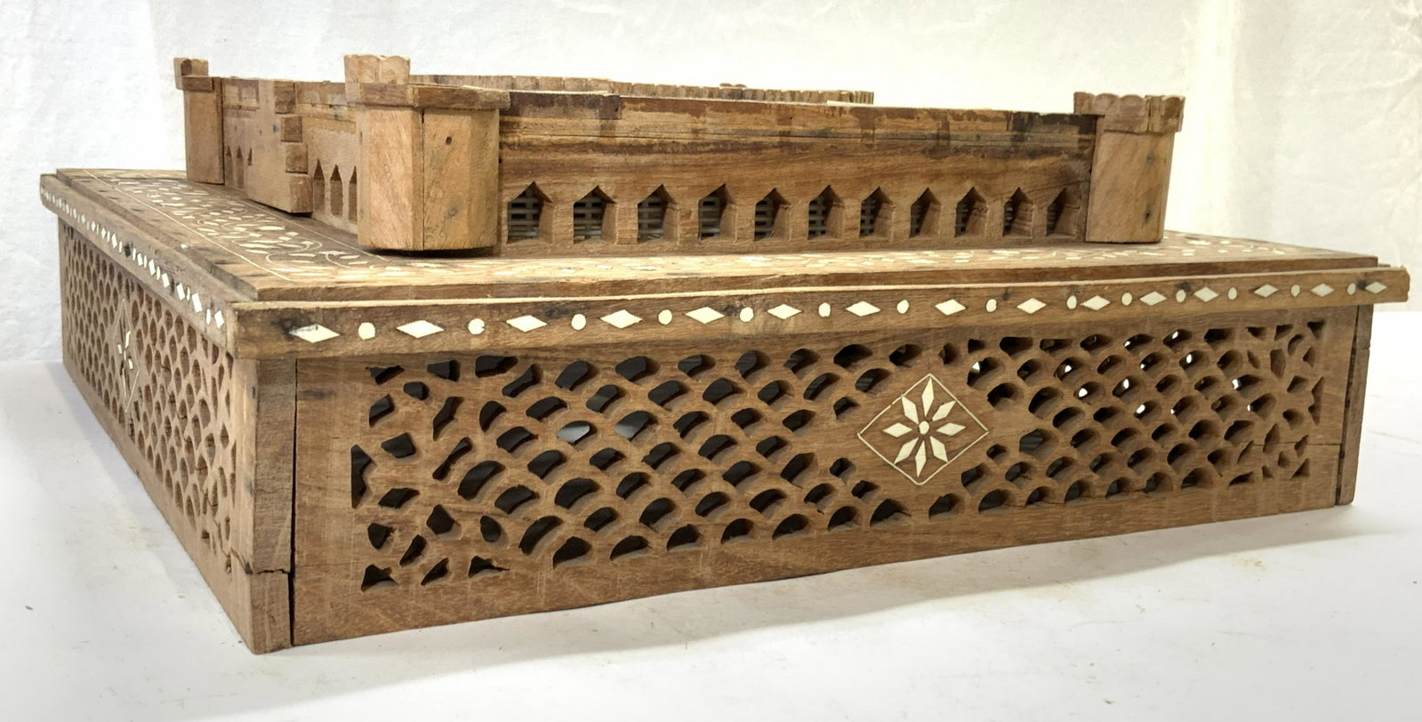 Vntg Wooden Tibetan Base W Bone Inlay: Base is vintage and wooden. Structure contains 2 pieces. Base has intricate cream toned bone inlay. Piece has pierced detail. Piece measures approx 15.5 inches square 6 inches tall. Base, pedestal, wo