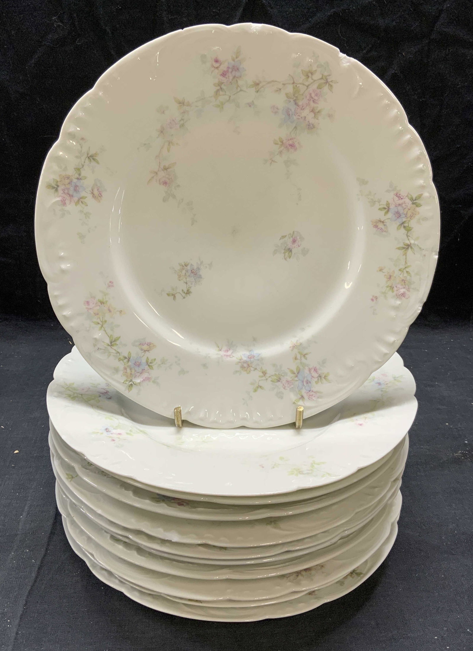 Set 11 HAVILAND LIMOGES Floral Porcelain Plates Fr: Set of 11 Theodore HAVILAND by Limoges porcelain plates with floral motifs. Trademarked to undersides. Made in France. Measure approx. 9 inches diameter. Surface wear to all pieces including loss to p