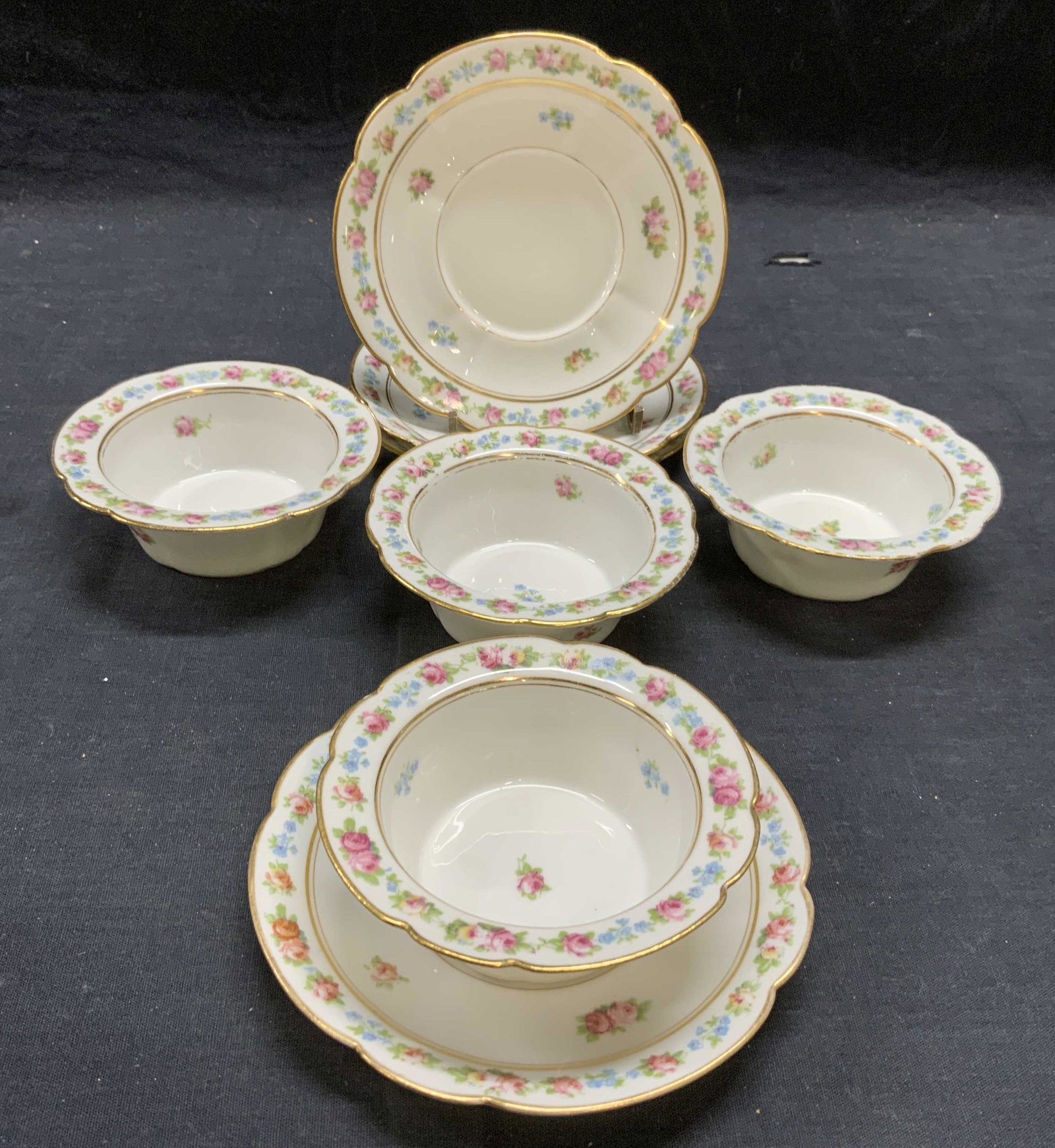 Set 8 LIMOGES Ahrenfeldt Porcelain Bowls & Plates: Set of 8 Limoges C Ahrenfeldt porcelain bowls and plates with floral patterns. 4 bowls, measure approx. 4 inches diameter and 1.5 inches tall each. 4 plates, measure approx. 5 3/8 inches diameter each