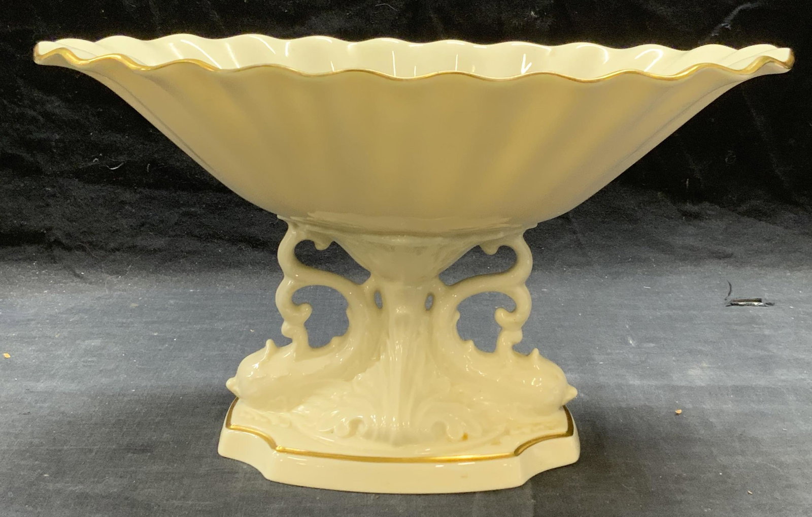 LENOX Porcelain Footed Bowl USA: Lenox cream toned porcelain footed bowl. Trademarked to underside. Made in USA. Some surface wear consistent with exposure. 12 x 5.25 x 6.75 inches. Lenox, Lenox bowl, porcelainware, porcelain bowl, t