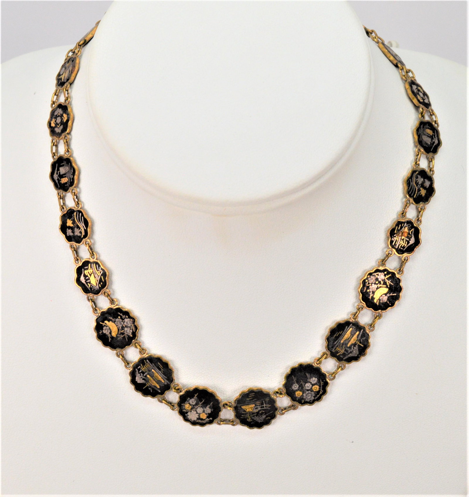 Vintage Copper Niello Ladies Necklace: This is a beautiful vintage piece similar to the jewelry created in Siam pre-war. Graduated stations of pictures depicting Asian culture adorn this necklace. It is 15 in length.-NB