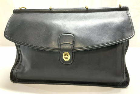 COACH Thick Leather Briefcase, Hand Crafted USA: Coach black leather briefcase , fold over flap with brass turn lock Measures 16.75 in. L x 9.5 in ht. Exterior folder pocket 15.x x 8.5 in., exterior pocket under fold over, 13 x 8.5 in. Interior is a