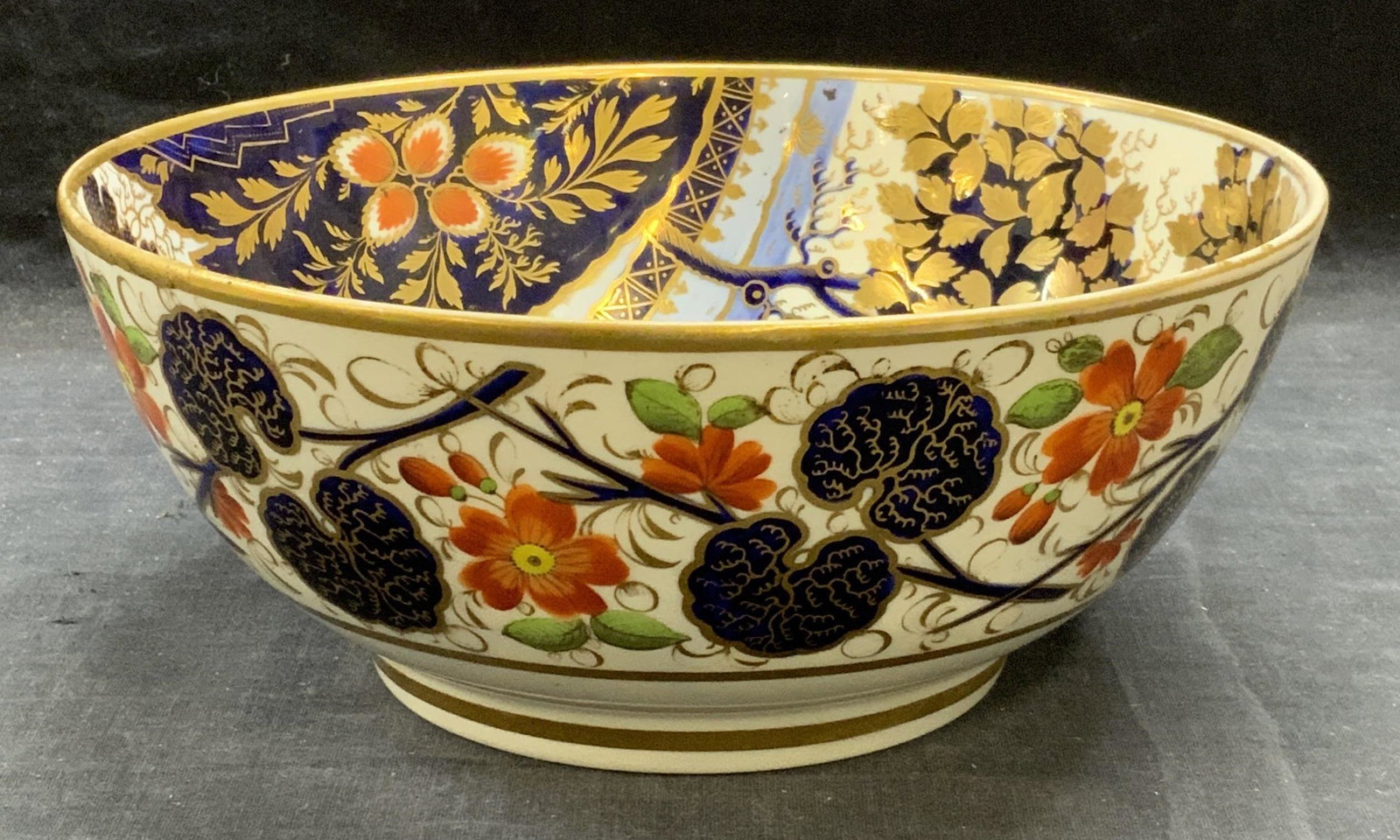 NEW HALL Elephant Imari Porcelain Bowl: New Hall elephant pattern imari Regency porcelain bowl. Vintage, possibly antique. Some surface wear consistent with exposure, crazing and some loss to paint observed. Measures approx. 8.75 inches dia