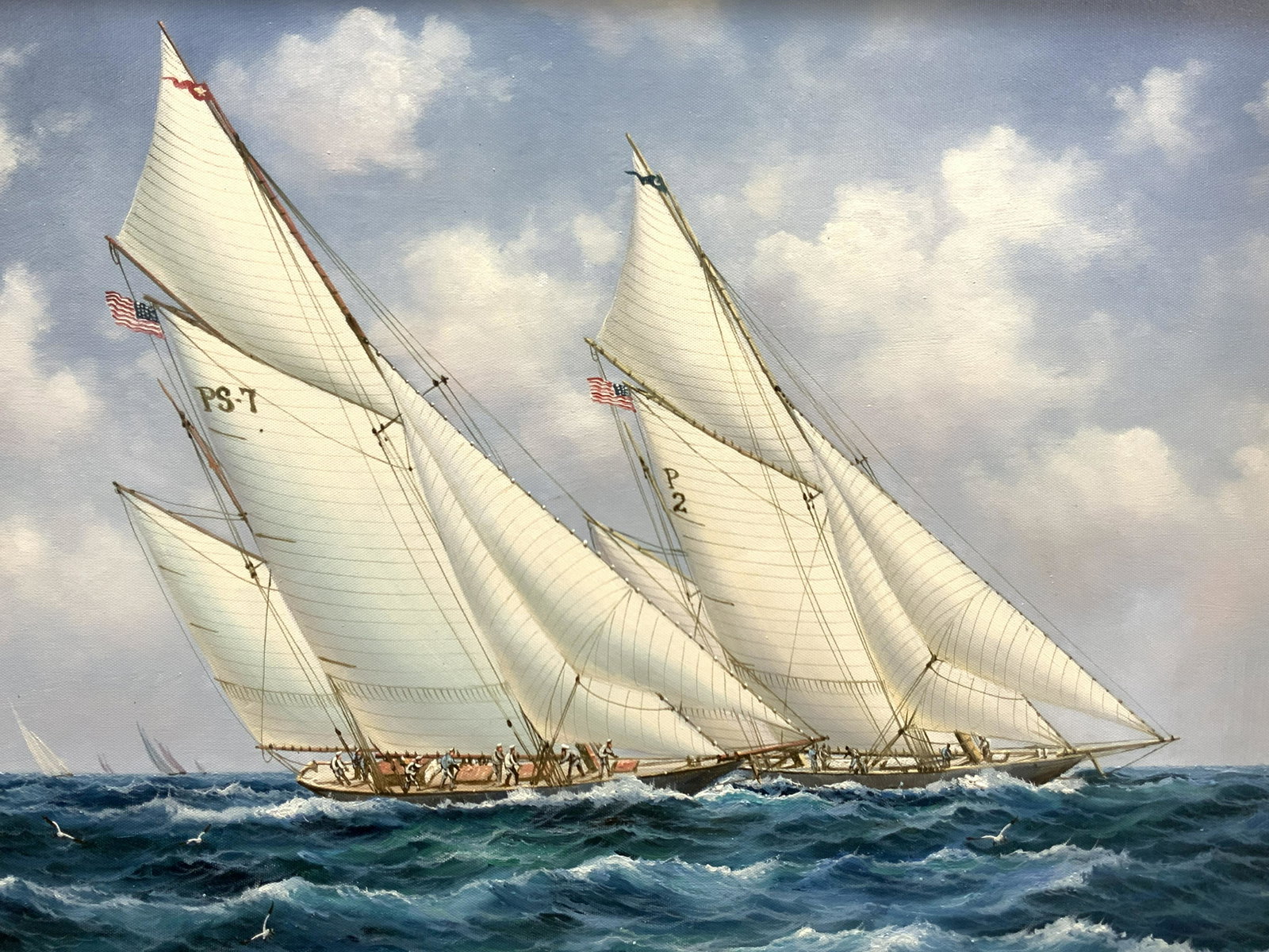 Framed Ocean Sailing Oil Painting: Framed oil painting depicting two boasts sailing next to each other. 1 reads on sail pS7 the other reads P2 Framed in light toned wooden frame. Approximately 22 x 26 inches. Window measures 19.5 x 23.