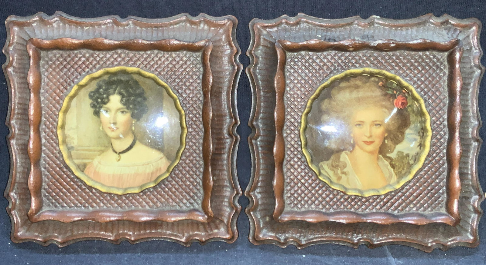 Pair SYROCO WOOD USA Frames W Portrait Lithos: Pair of SYROCO WOOD composite framed portraits. Depicting 1 brown haired and blonde haired women. Frame is ornate with French style cut edges and gold metal leafed inner edges. Approximately 6 x 6 inc