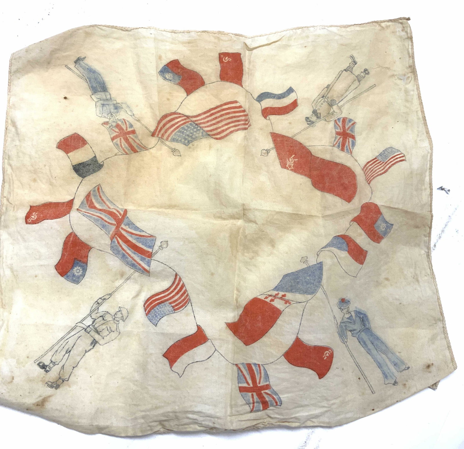 Vtg Cotton Hankie w World Flags and Military: Vintage Hankie, measures 10.5 x 11 in. Depicts 4 military men in specific uniforms according to their nation. Each man holds a pole , a string of flags flying in the wind encircles the center of the H