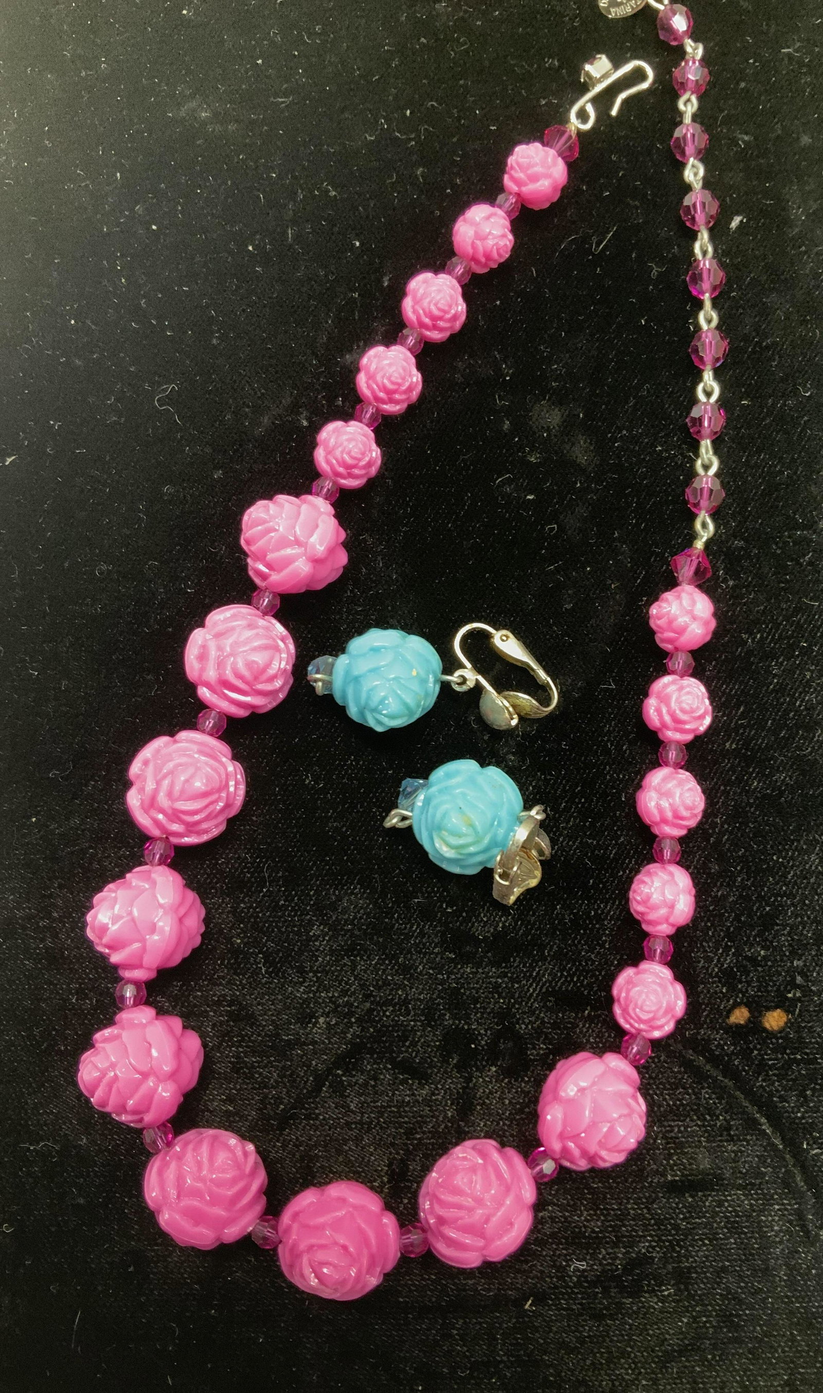 2pcs Tarina Tarantino Handmade Rose Bead Jewelry: Pink rose graduated bead choker necklace with signed charm Tarina Tarantino. Necklace measures 16 in. L. Turquoise blue rose bead pendant earrings with clip on clasps, 1.75 in. L vintage jewelry, Esta