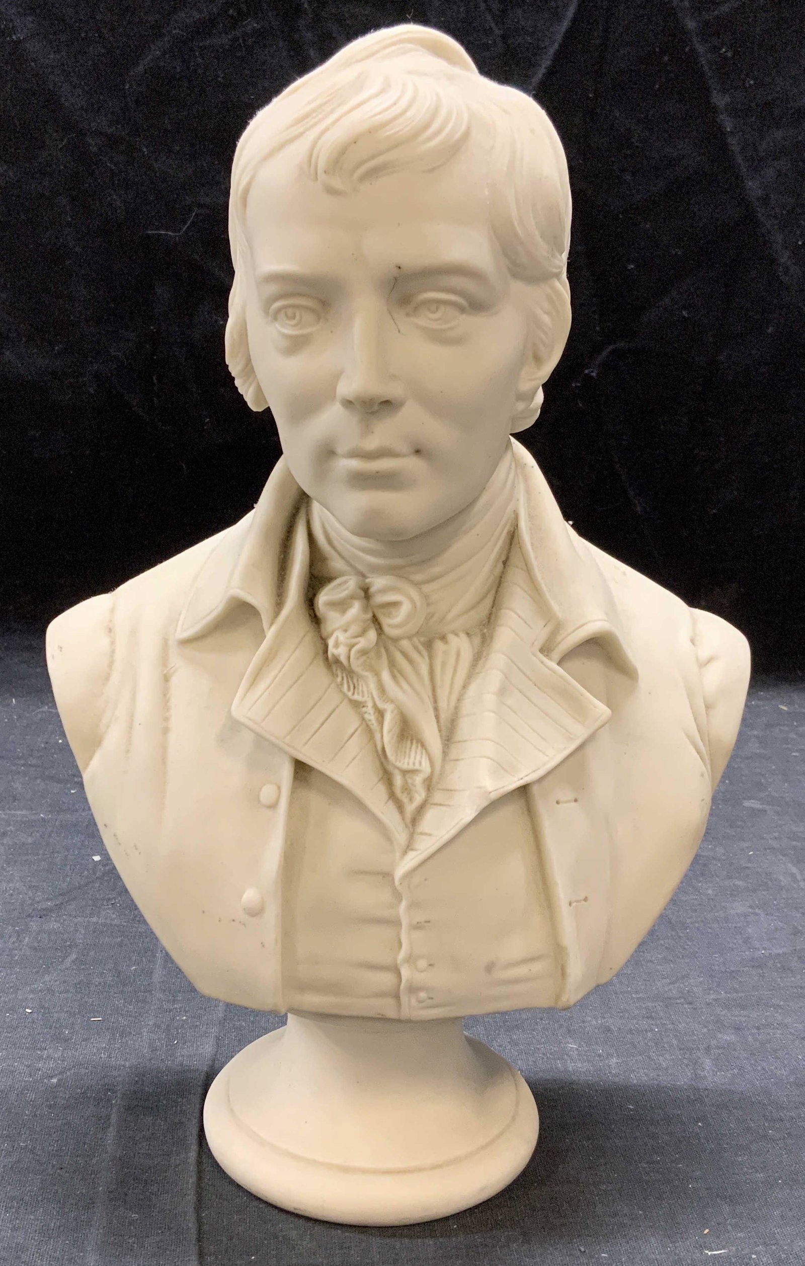Vintage Porcelain Bust of a Man: Vintage porcelain bust of a man. Some surface wear consistent with exposure. Measures approx. 7 x 3.5 x 10.5 inches. Bust, bust sculpture, bust of a man, sculpture, table sculpture, porcelain bust, de