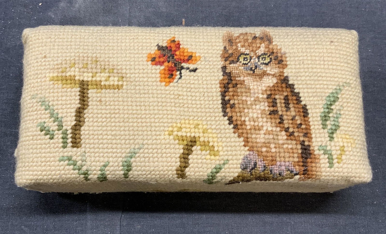 Vintage Needlepoint Covered Owl Doorstop: Vintage doorstops with needlepoint owl motif cover. Piece has weight. Measures approx. 8.5 x 4 x 2.5 inches some wear to material consistent with exposure. Doorstop, vintage doorstop, needlepoint, nee