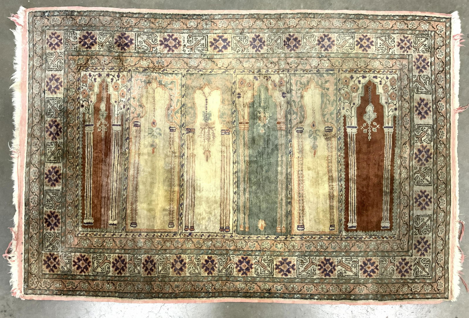 Vintage Handmade Anatolian Afghan Silk Rug: Rug is vintage possibly antique. Piece appears to be silk possibly wool. Rug is handmade. Piece has intricate multi toned floral, vine, geometric & column detail. Rug measures approx 50 inches long 33