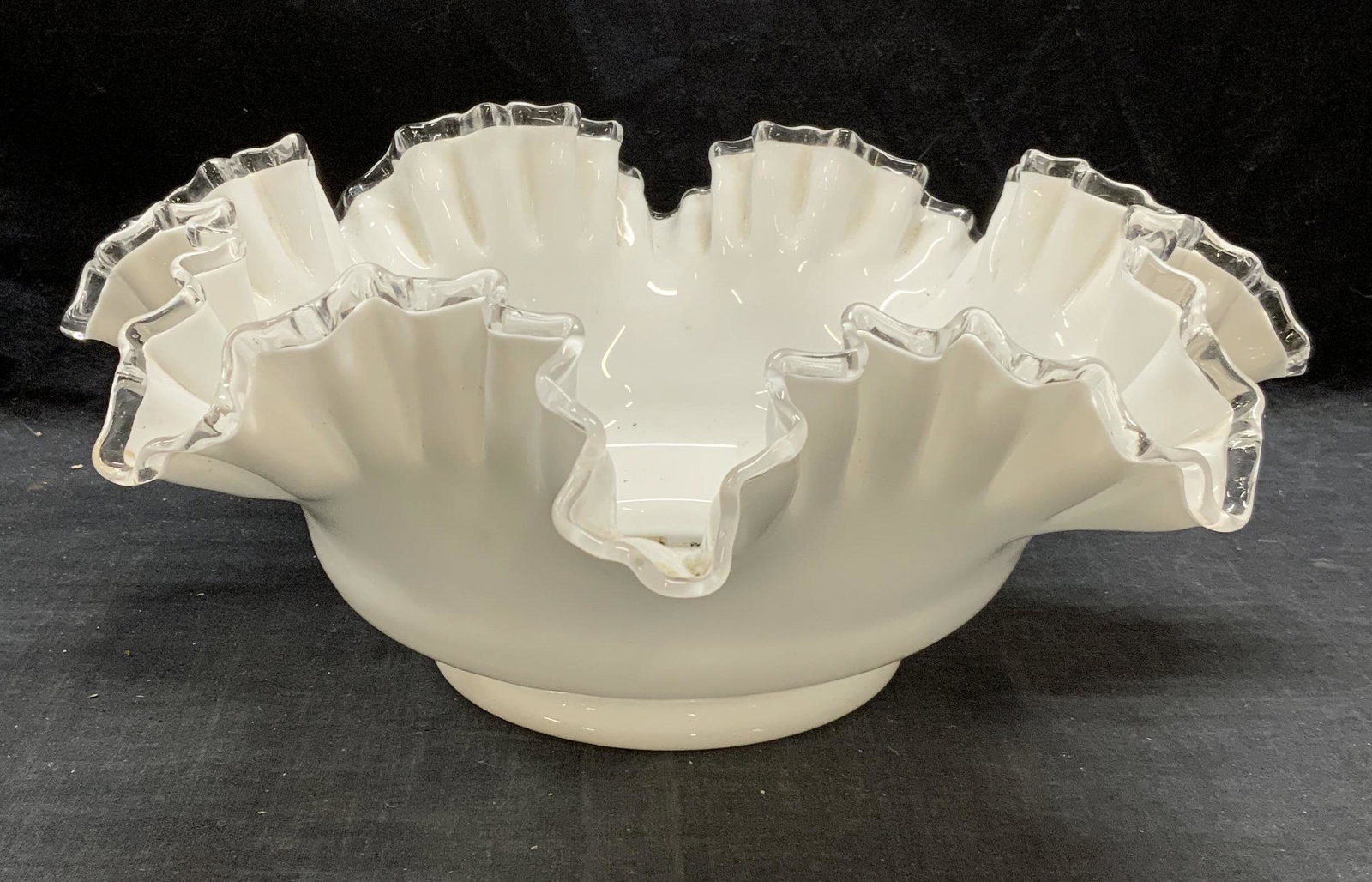 Opaline Art Glass Handkerchief Rim Bowl: White Opaline art glass bowl with ruffle handkerchief rim. Some surface wear consistent with exposure. Measures approx. 13 x 5.25 inches. Art glass, Opaline glass, handkerchief glass, art glass bowl,
