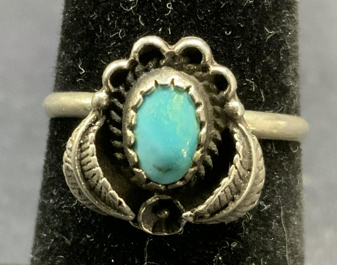 Sterling Silver Turquoise Ring, Jewelry: Sterling silver ring with turquoise gemstone. Size 5. Setting measures approx. .5 x .5 inches. Tests positive for sterling using PuriTEST kit. Total weight .06 ozt. Estate jewelry, fine jewelry, cockt