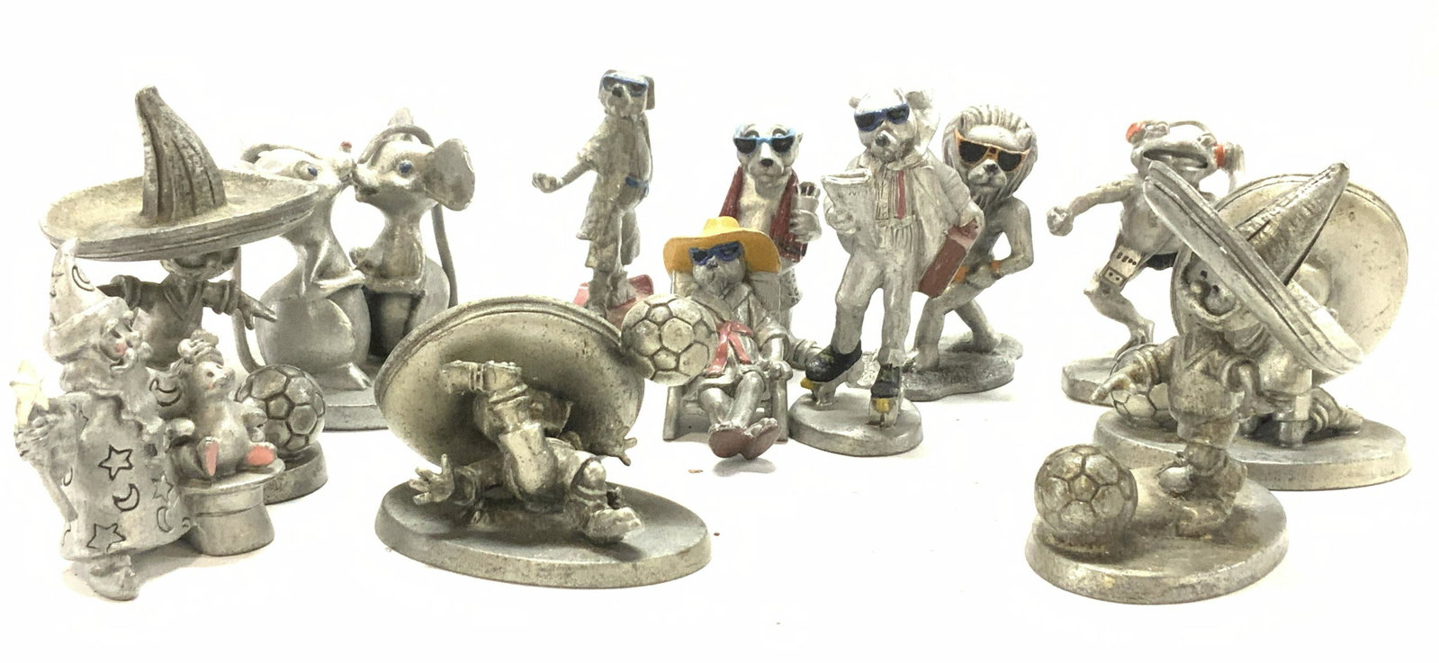 Set 13 Fine Pewter by Selangor Crafted Figurines: 1984 Sport- Billy Productions Official Mascot Mexico 86 ‘Pique figurines, 4 total , one figural needs repair to base. Measure 2.5 x 2 in. H x L. Royal Selangor pewter lion figurines , on skateboard 