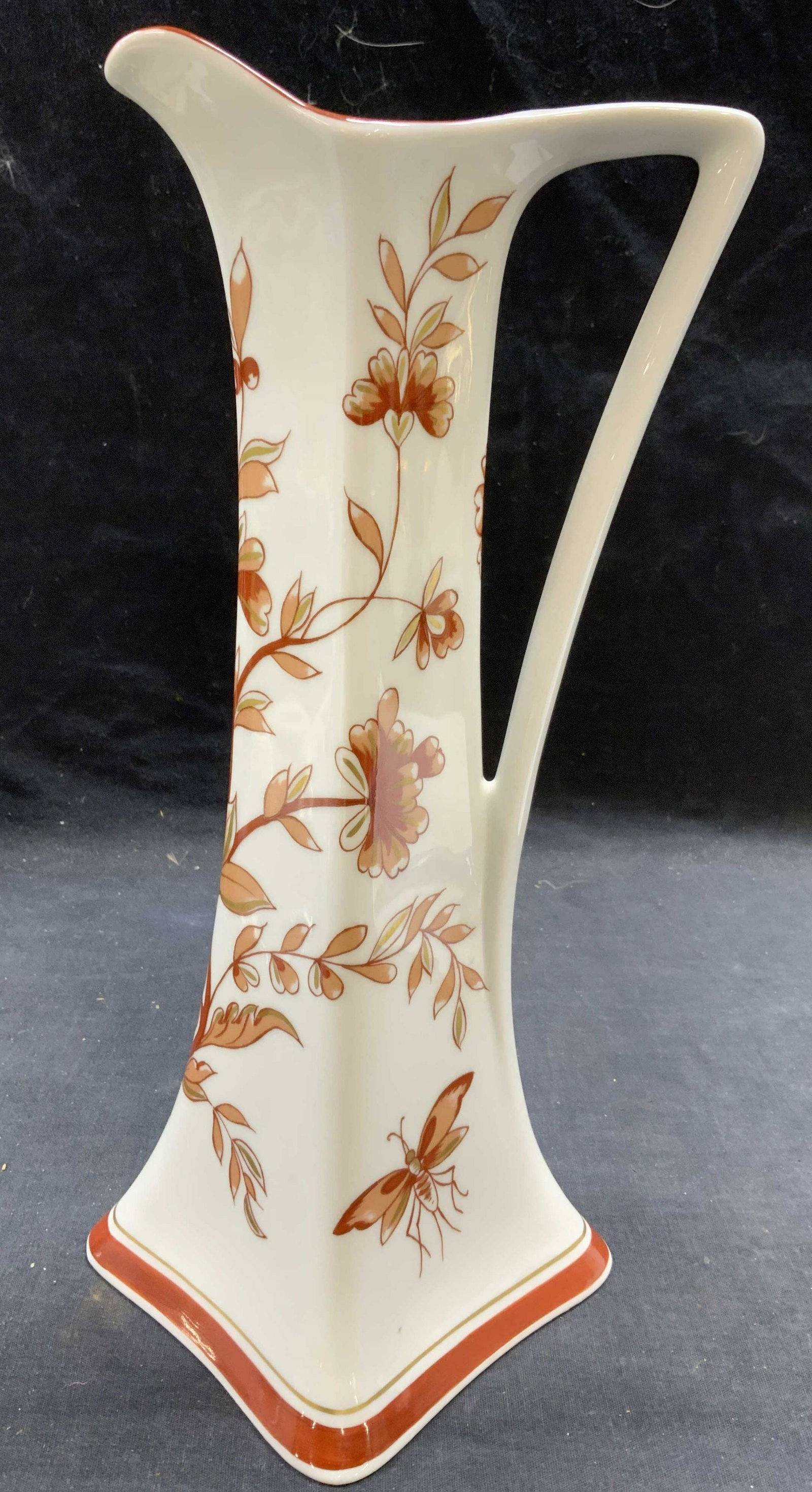 Limoges France Porcelain Violet Pitcher: Limoges France porcelain pitcher with Violet floral pattern in red. Trademarked to underside. In good condition. Made in France. Measures approx. 6.25 inches wide and 13 inches tall. Limoges, Limoges 