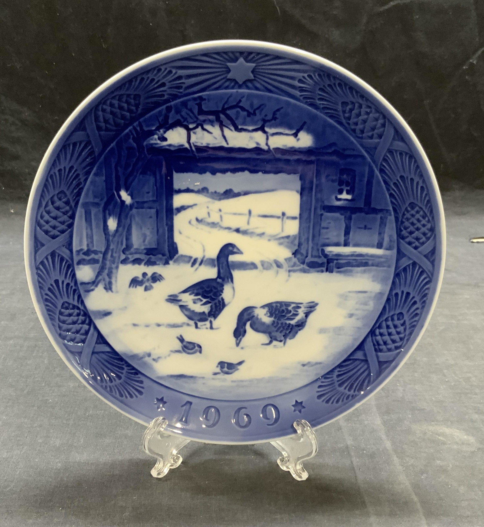 Royal Copenhagen 1969 Farmyard Porcelain Plate: Vintage Royal Copenhagen 1969 porcelain In The Old Farmyard bird plate in blue. Trademarked to underside. Made in Denmark. In good condition. Measures approx. 7 inches diameter. Royal Copenhagen, roya