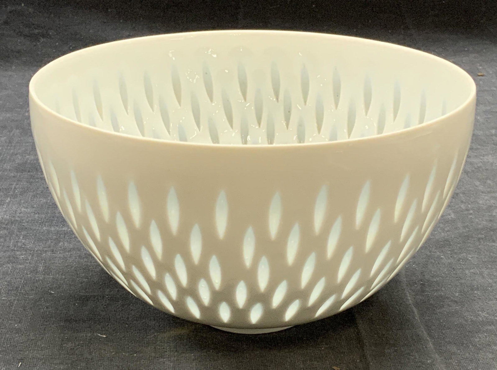 Arabia Finland White Porcelain Bowl: Arabia Finland white porcelain bowl. Trademarked to underside. Some surface wear consistent with exposure. Measures approx. 5 5/8 inches diameter and 3.25 inches tall. Arabia Finland, Arabia Finland b