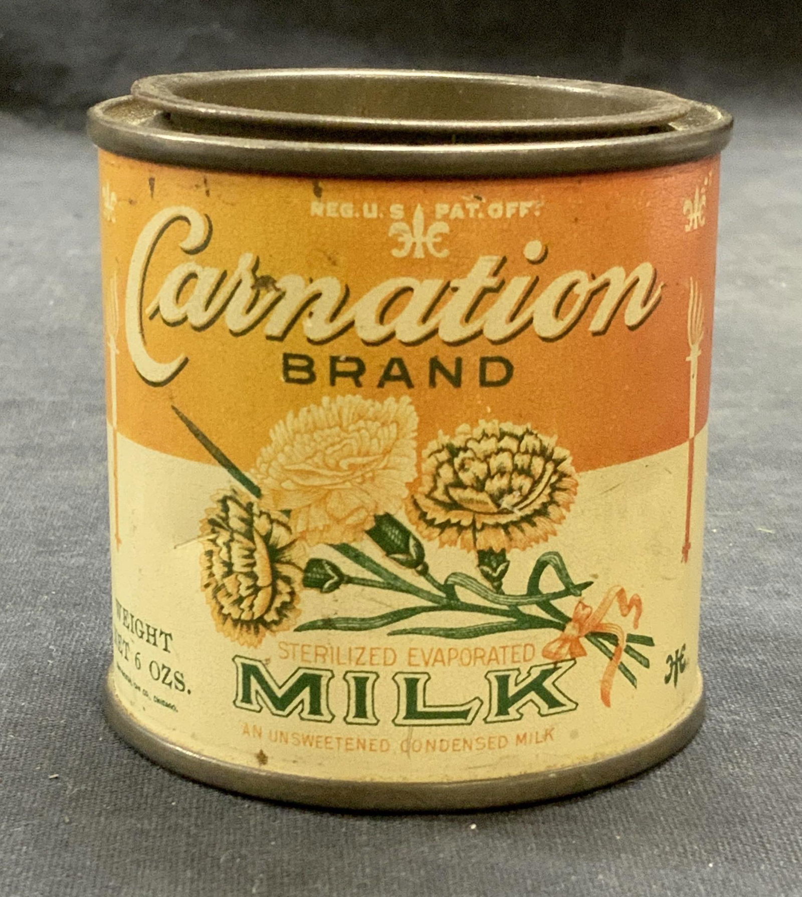 Antique Carnation Evaporated Milk Can Coin Bank (1 of 6)