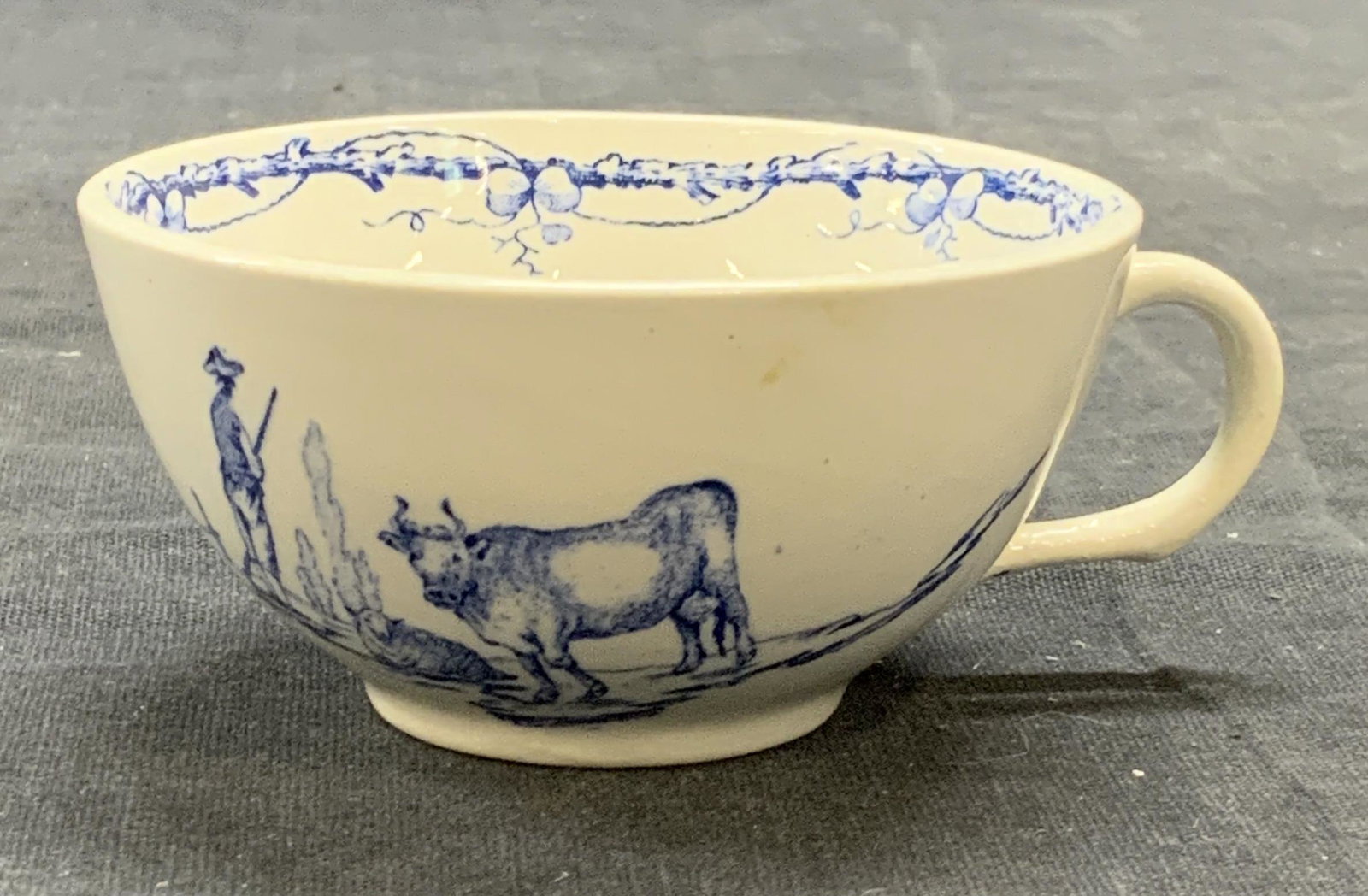 Vtg K&G LUNEVILLE France Ceramic Cow Demitasse: Vintage, possibly antique, K & G LUNEVILLE France ceramic demitasse cup with cow motif. Trademarked to underside. Some surface wear consistent with exposure. Measures approx. 2 7/8 x 1.5 inches. Prope