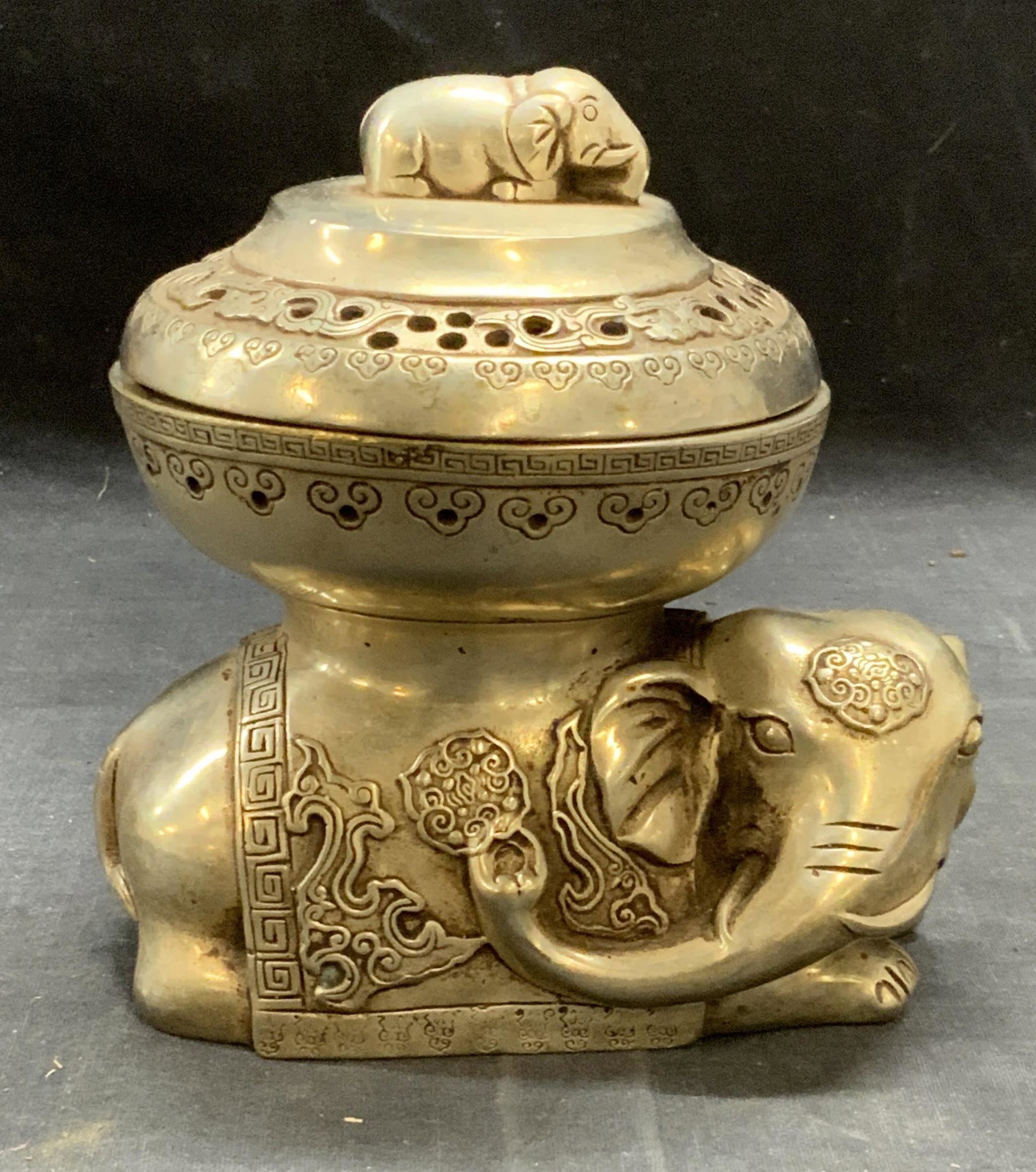 Stamped Chinese Silver Tn Elephant Censer: Stamped Chinese silver tone metal incense burner with elephant motif. Signature stamp to underside. Some surface wear consistent with exposure. Measures approx. 5.5 x 4.5 x 5.5 inches. Piece has weigh