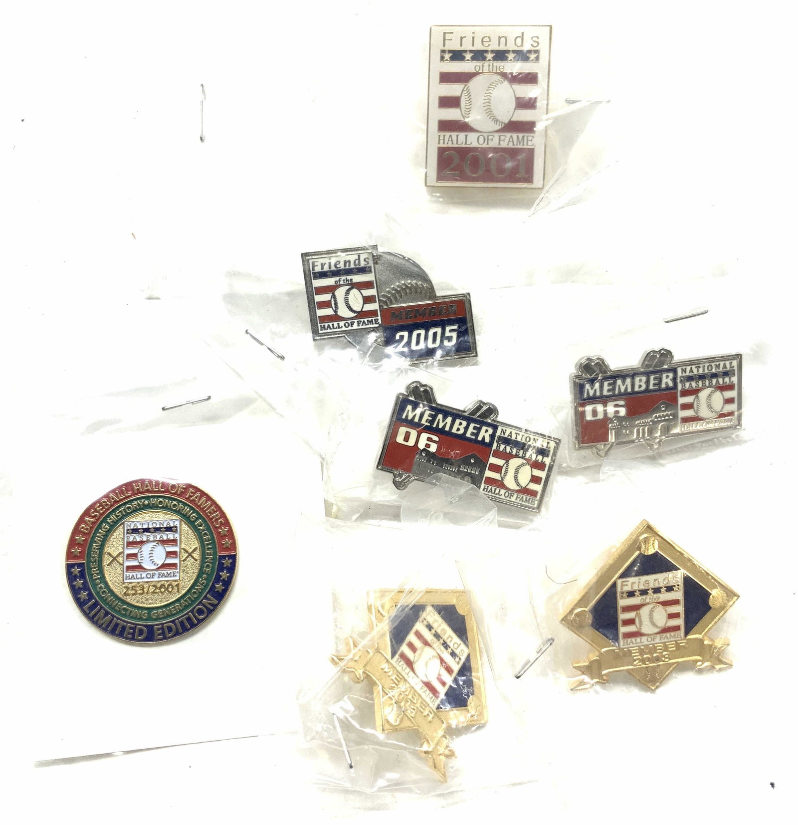 Lot 7 Baseball Hall Of Fame Collectible Pins, NIP: Enamel tack lapel pins all annual Friends of the Baseball Hall of Fame. New old stock, all sealed in plastic packaging. 2 pins c.2003 , 2 pin. c. 2006 Limited edition Baseball Hall of Famers Pin #253/