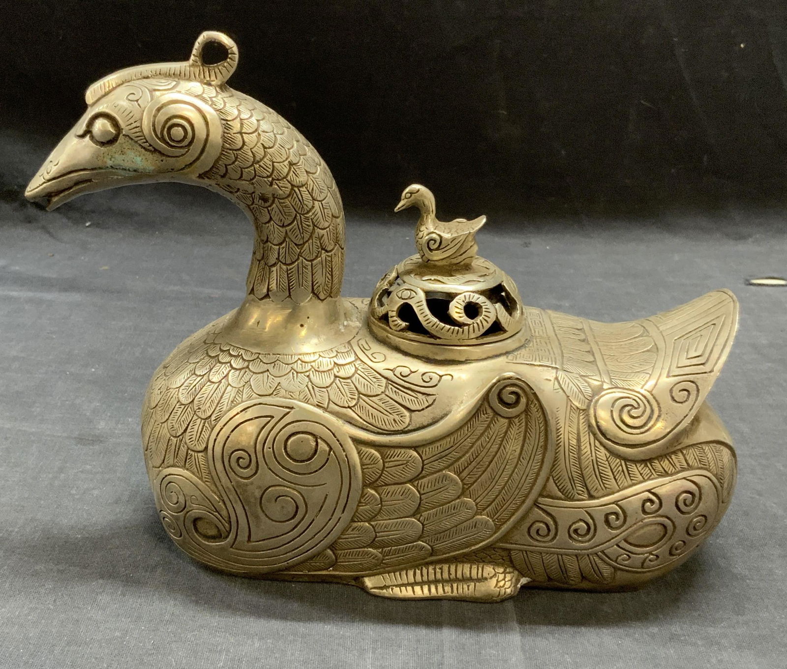 Stamped Chinese Pewter Duck Incense Burner: Stamped Chinese pewter duck from incense burner. Stamped to underside. Some surface wear consistent with exposure. Measures approx. 9 x 3.5 x 6.75 inches. Chinese incense burner, oriental incense burn