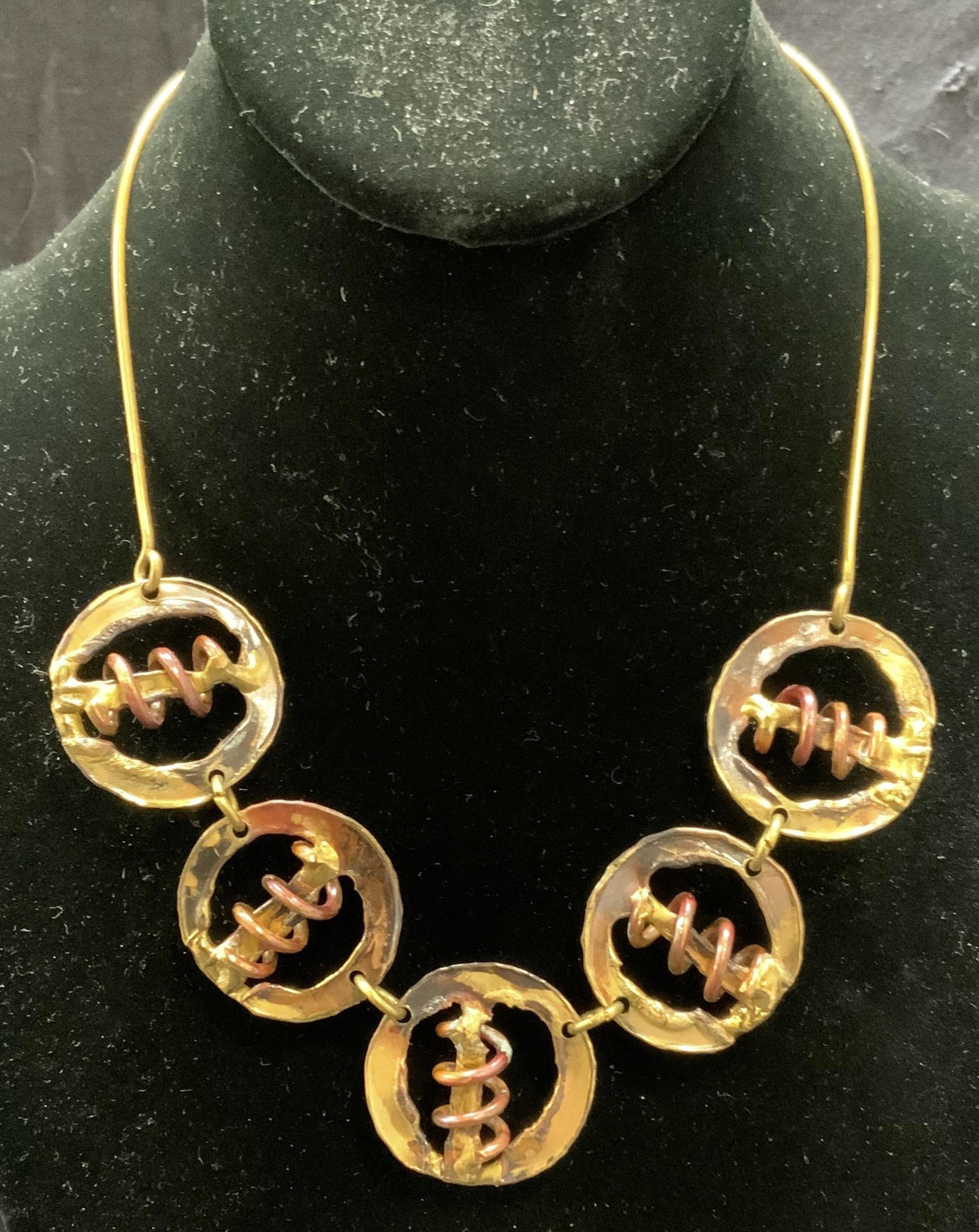 Brass Pendant Choker Necklace, Artisan Jewelry: Brass pendant choker necklace. Handcrafted artisan jewelry. Measures approx. 15 inches long. Pendant measure approx. 1.25 inches diameter. Some surface wear consistent with exposure. Estate jewelry, c