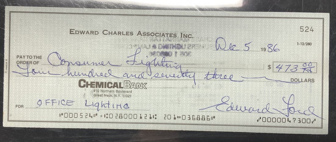 Personal Signed Check by Ed Whitey Ford c. 1986: Signed Check by legendary NY Yankees baseball pitcher whitey ford to Consumer Lighting, dated Dec. 5 1986, a Chemical Bank check ( Great Neck, NY). Signed in blue ball point ink. Signed Edward Ford of