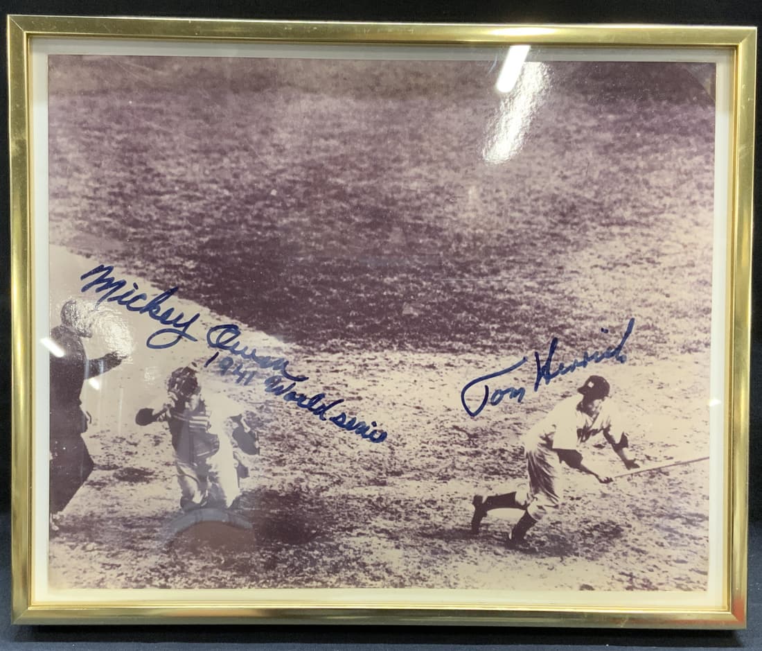 Signed T Henrich & M Owen 1941 Yankees Photo: Black and white photograph signed by Tommy Henrich and Mickey Owen, 1941 New York Yankees. Signed in ink center left and right. Professionally framed in gold tone metal frame under op3 plexiglas. Not 