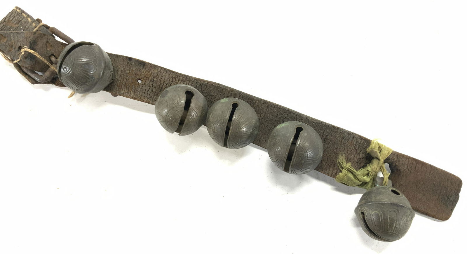 Etched Antique Bronze Jingle Bells: 5 affixed bronze ( possibly brass) jingle bells on a thick leather animal collar with buckle . Thought to be antique or early 1900s. Each bell measures 2 x 1.5 in., and have an etched design. Length o
