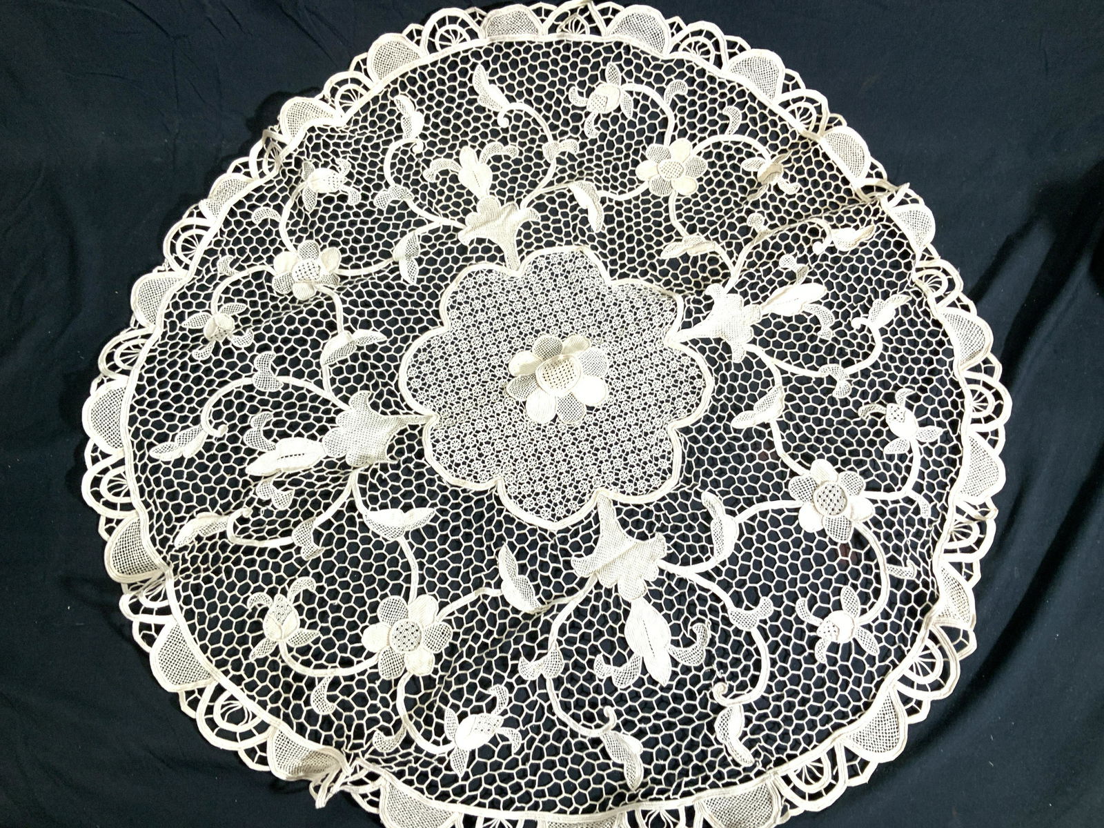 Centerpiece Round Crochet Doily: 32.25 in. Wide Round beige crochet Doily. Appears unused. Flower motif with honeycomb crochet pattern. Perfect for a round side side or as a table centerpiece. Home decor and accessories, Home linens,