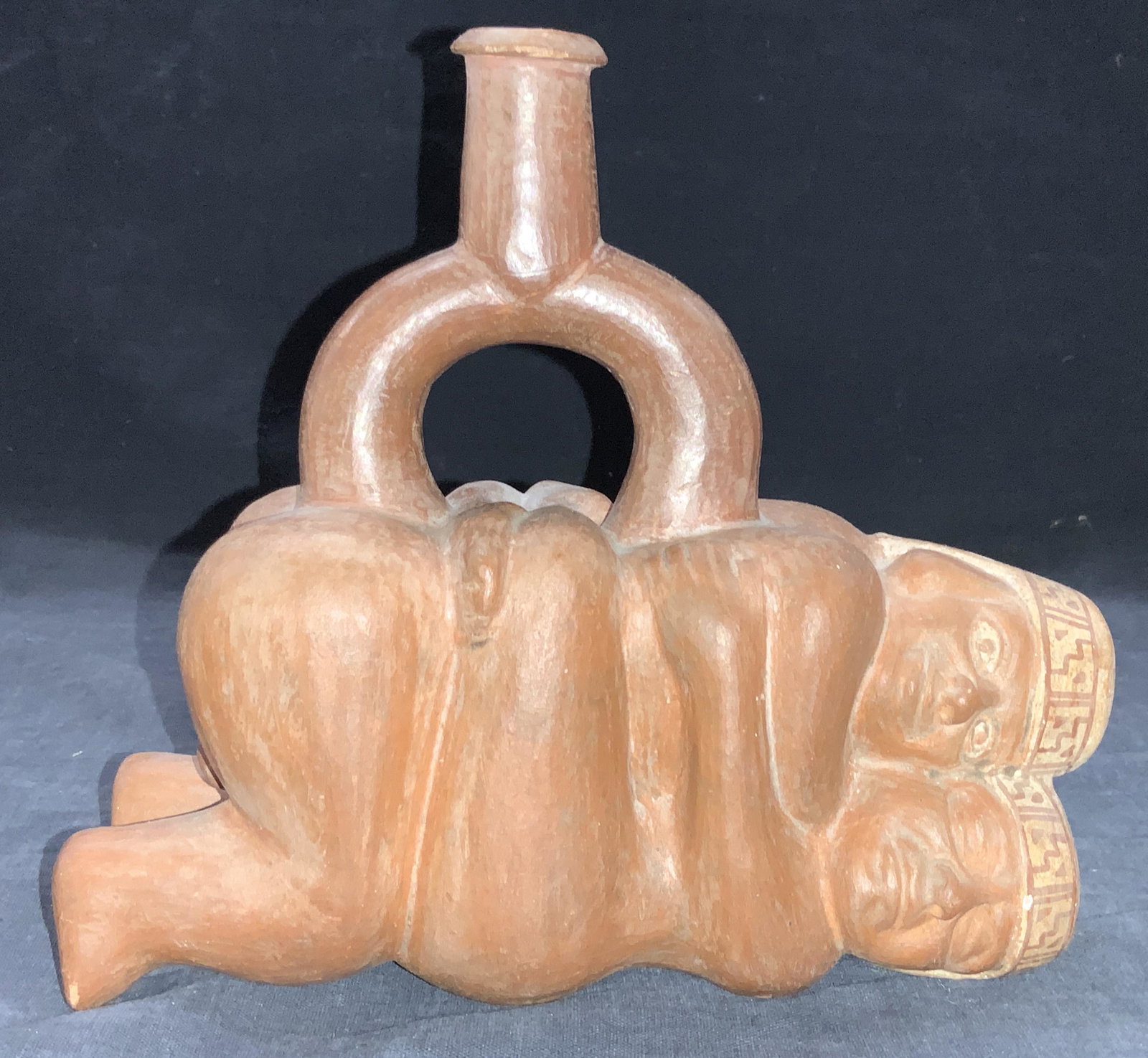 Pottery Erotica Art Vessel, Peru: Erotica art pottery vessel depicting a couple in an embrace. Marked on underside Reproduction, made in Peru. Approximately 7 inches tall and 7.5 inches long Minor wearing due to age and use. Pottery v
